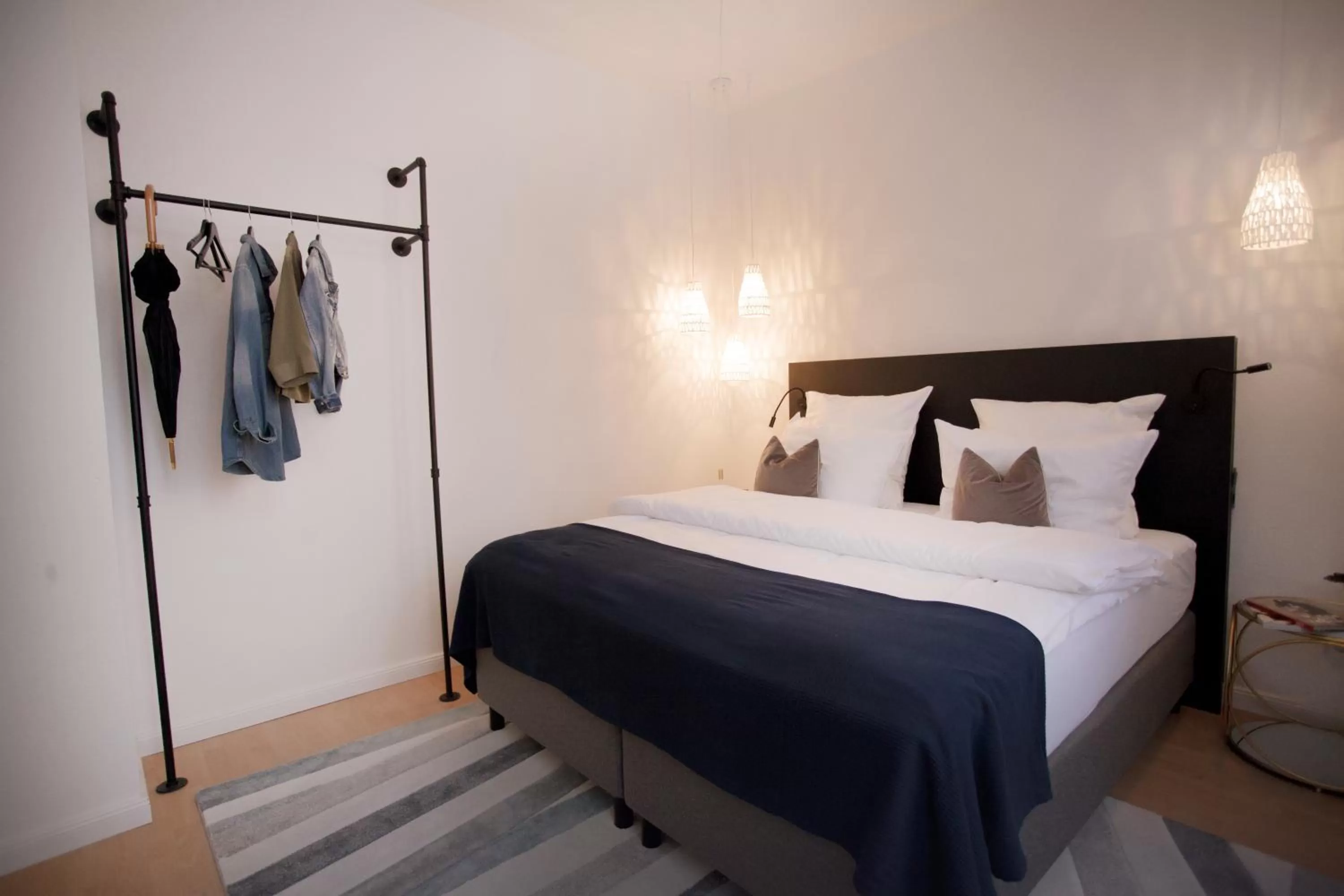 Bed in ONNO Boutique Hotel & Apartments