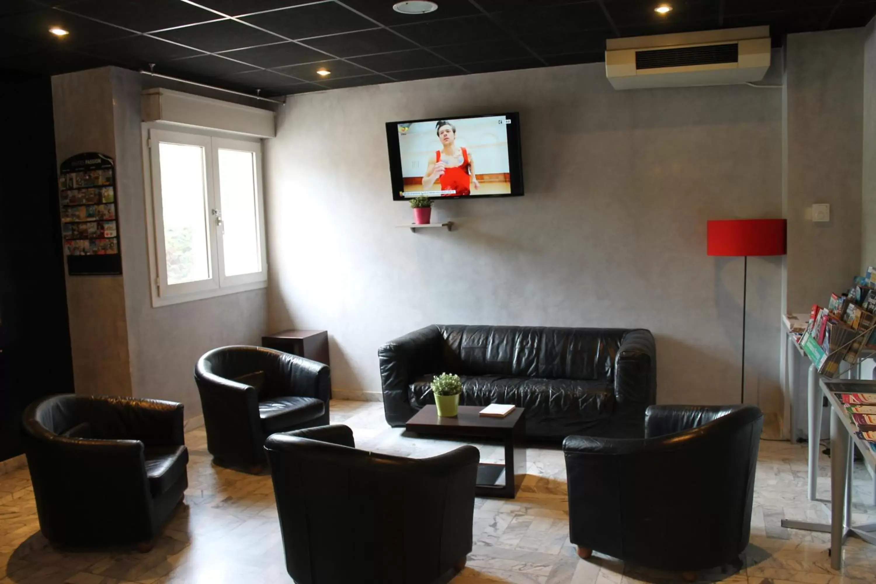 TV and multimedia, Seating Area in Adonis Arc Hotel Aix