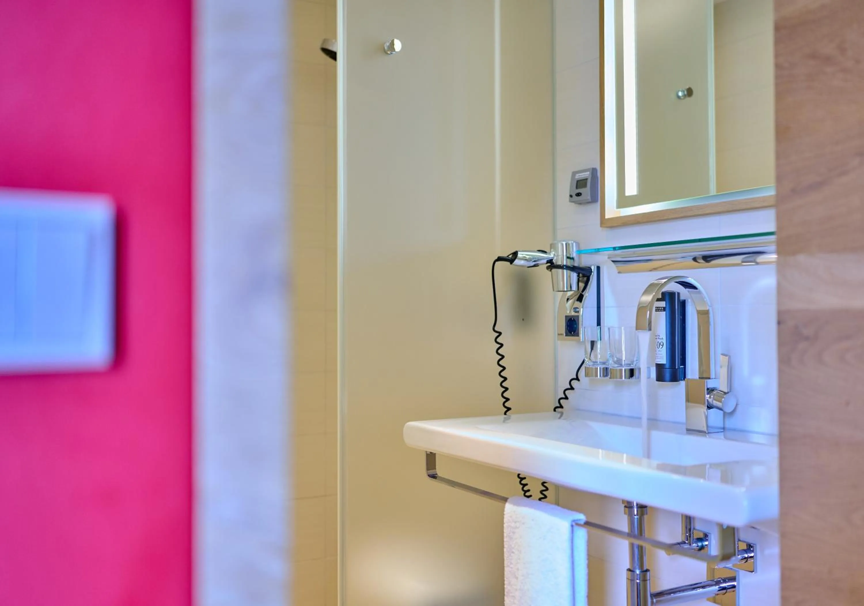 Bathroom in Asam Hotel