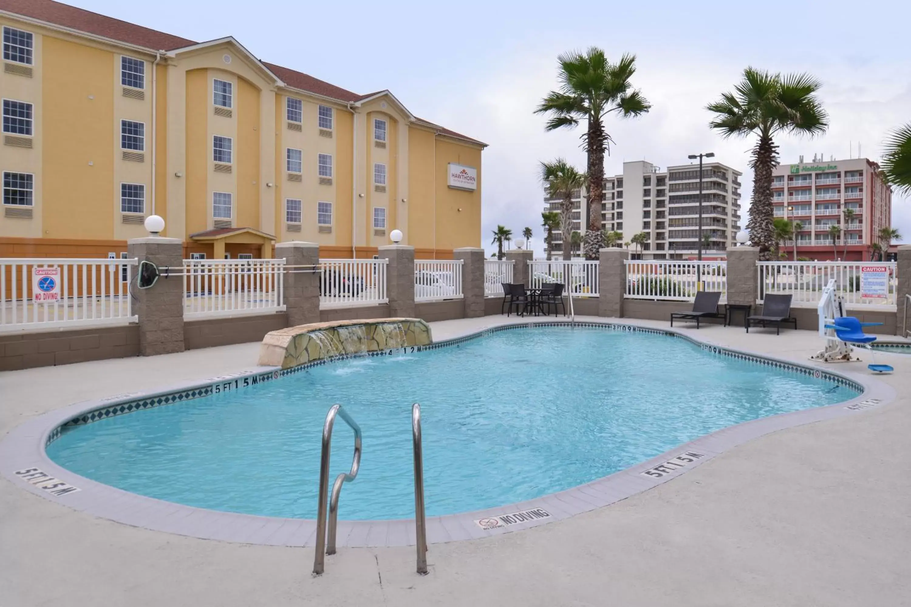 Swimming Pool in Holiday Inn Express & Suites Corpus Christi-N Padre Island, an IHG Hotel