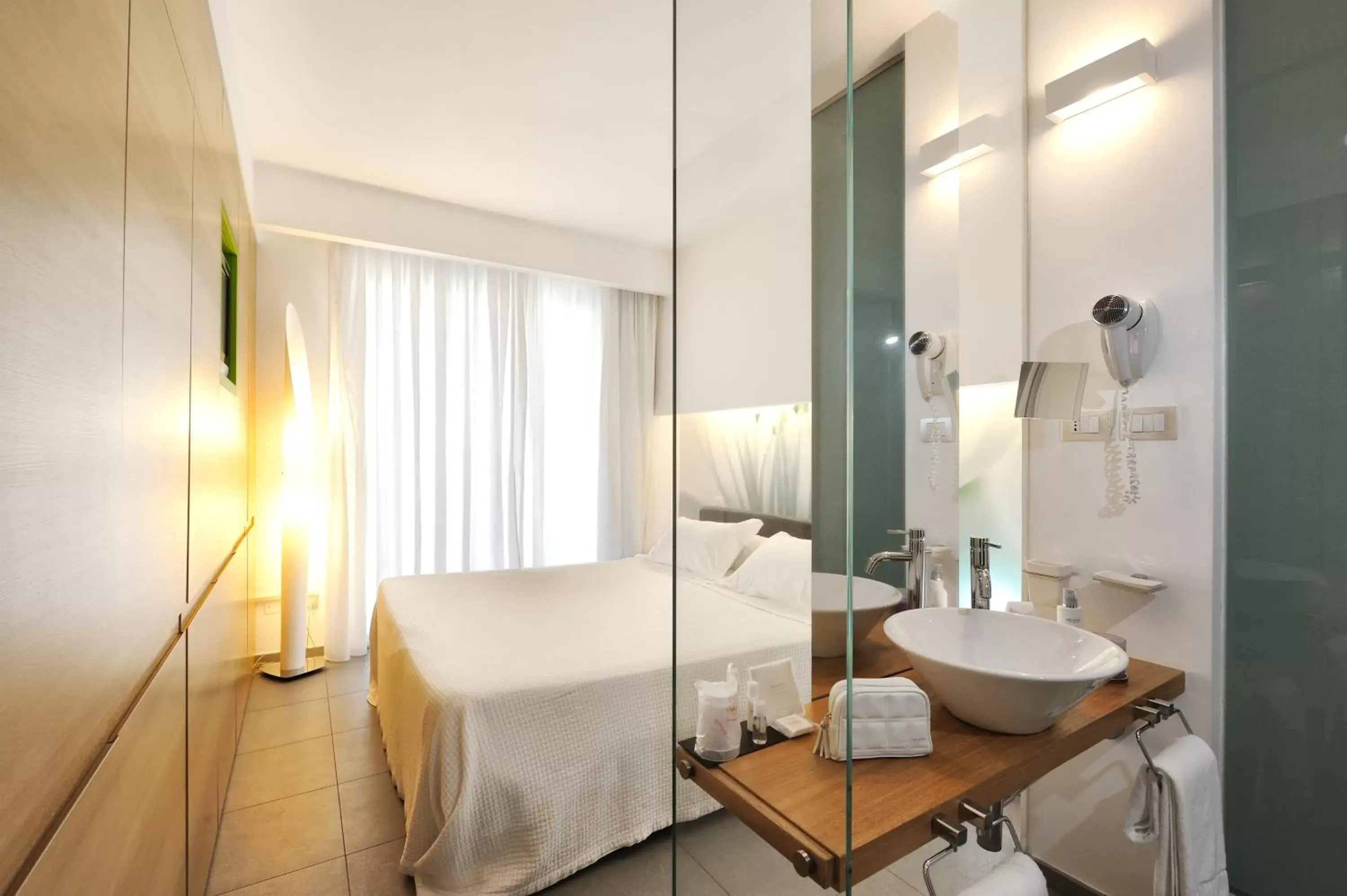 Bedroom, Bathroom in Valentino Resort