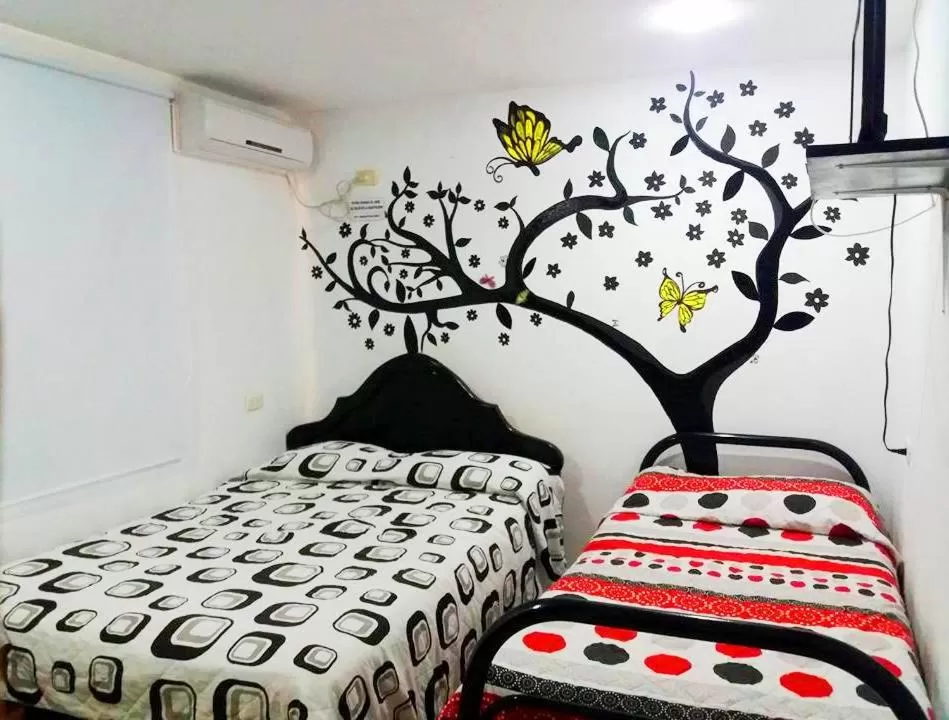 Triple Room with Private External Bathroom in Casa Turística Realismo Mágico