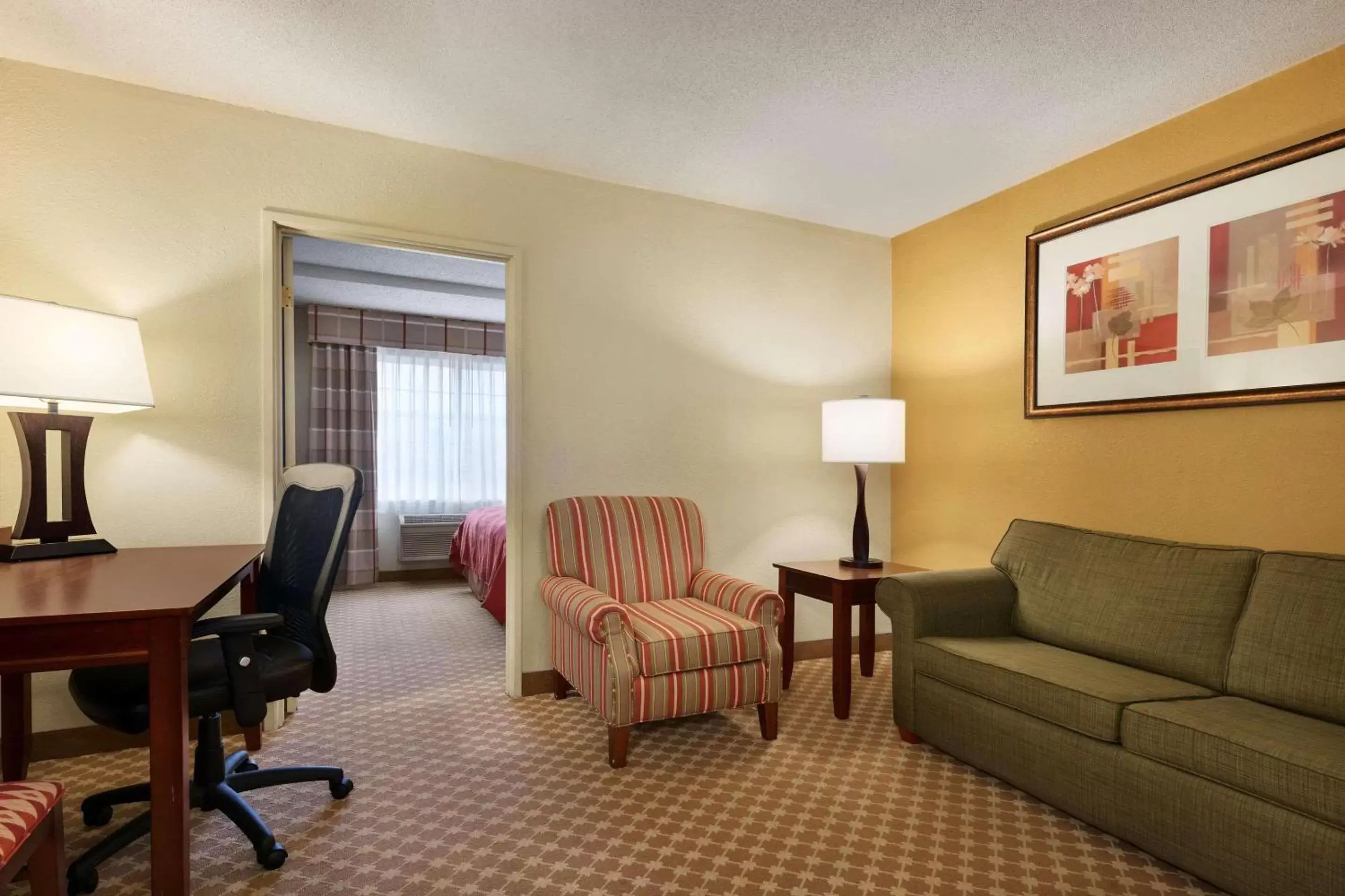 Bedroom, Seating Area in Country Inn & Suites by Radisson, Kalamazoo, MI