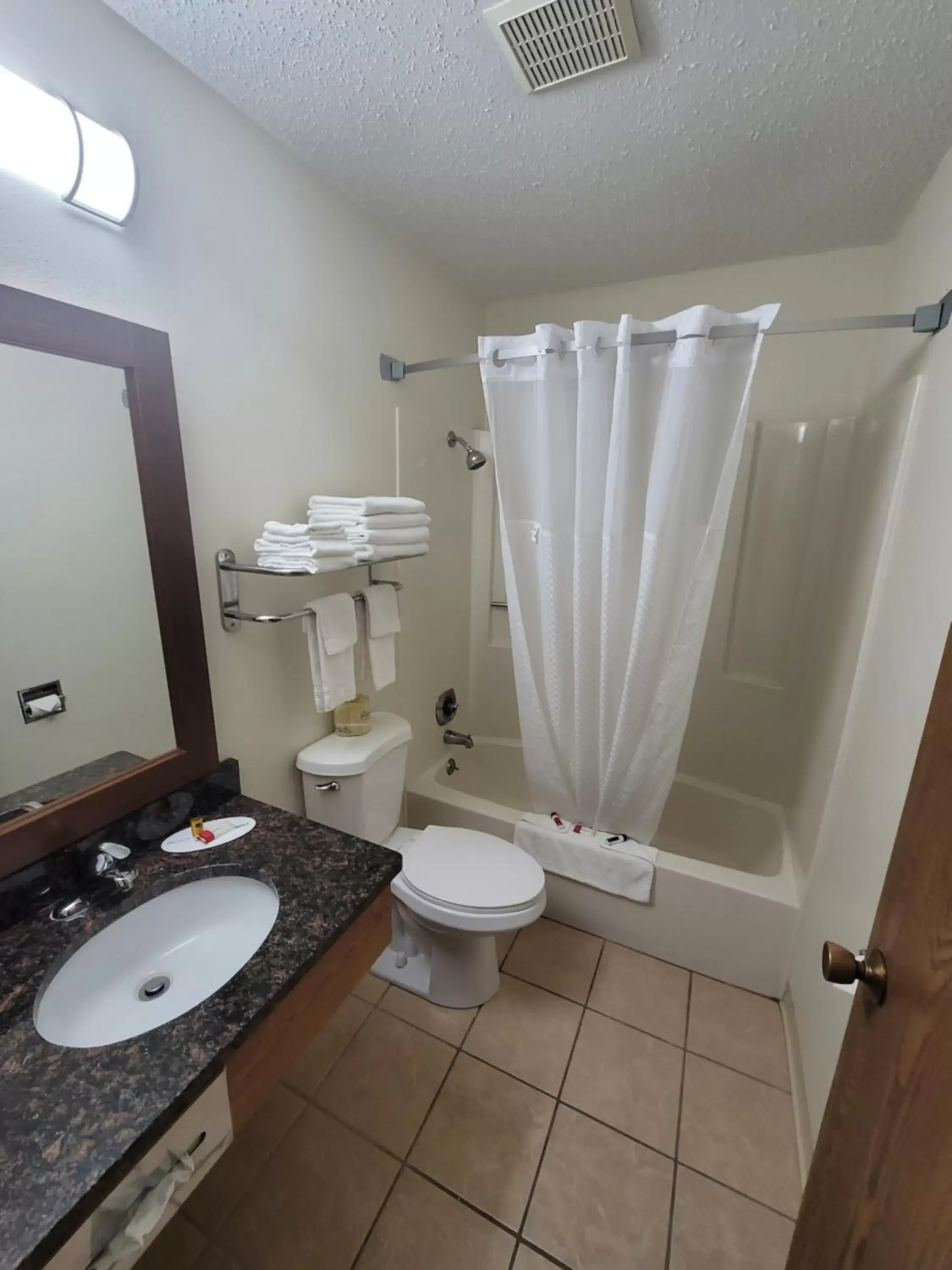 Bathroom in Super 8 by Wyndham Valentine NE