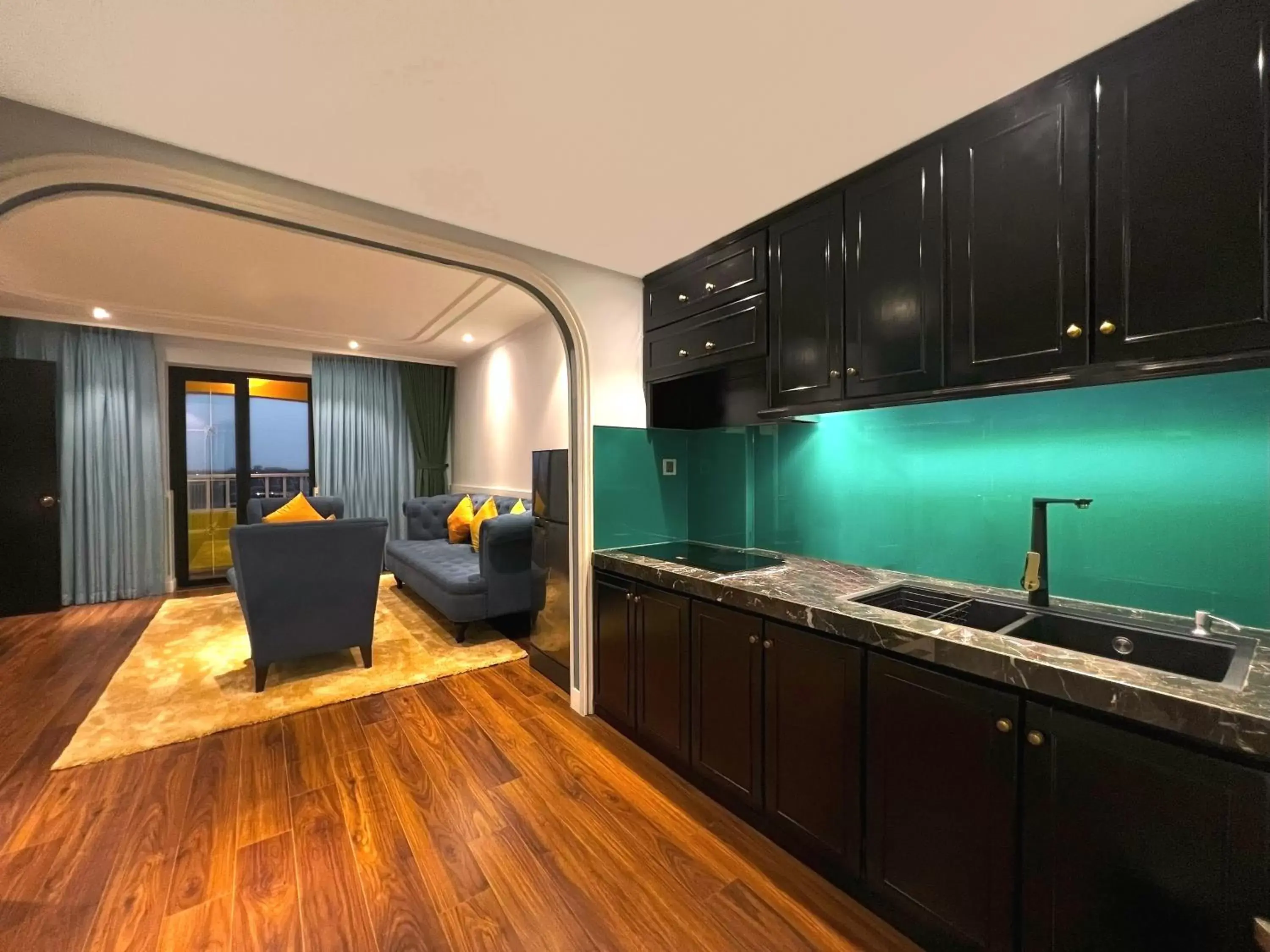 Living room, Kitchen/Kitchenette in Bel Marina Hoi An Resort