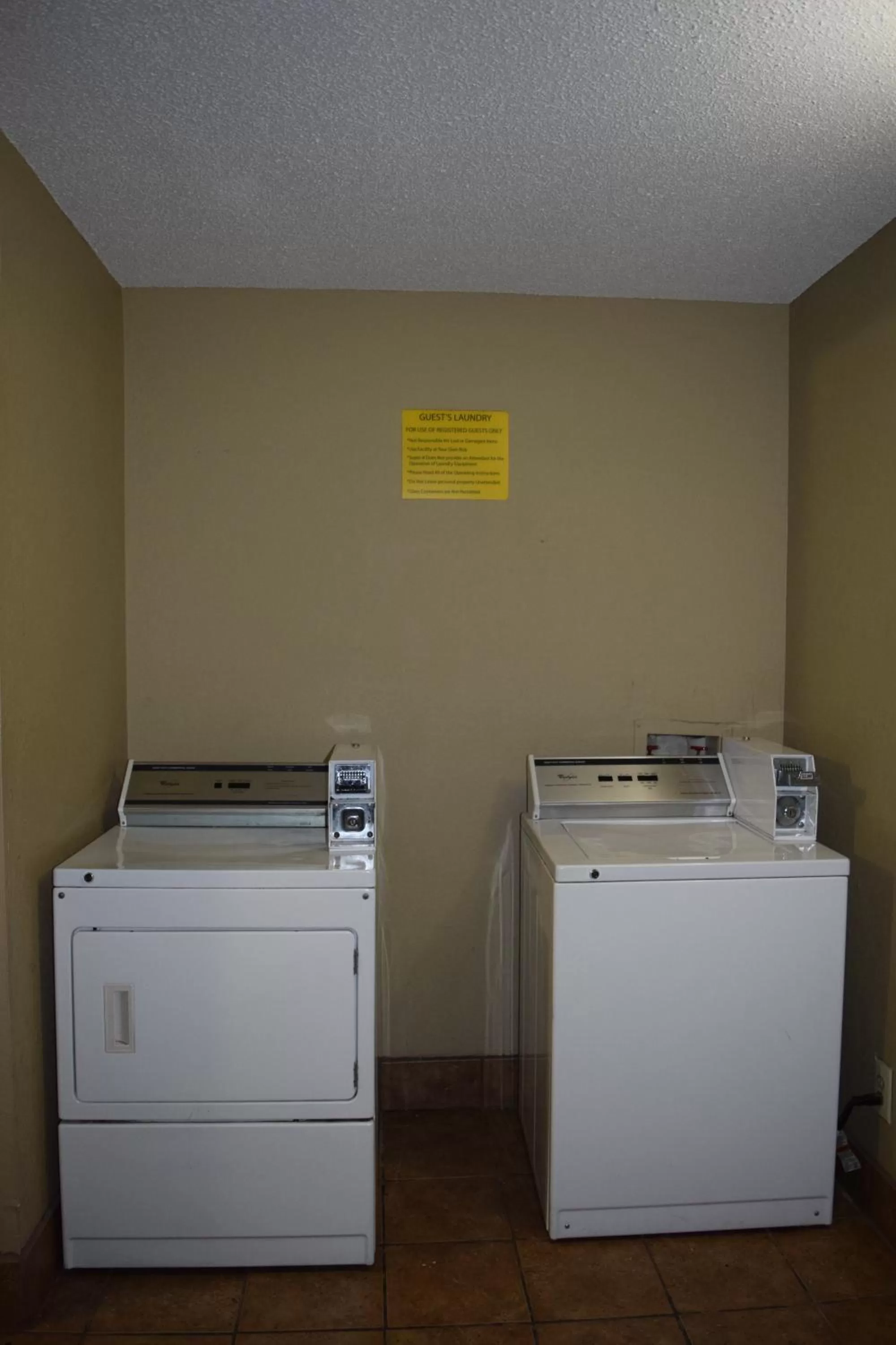 washing machine in Super 8 by Wyndham Homewood Birmingham Area