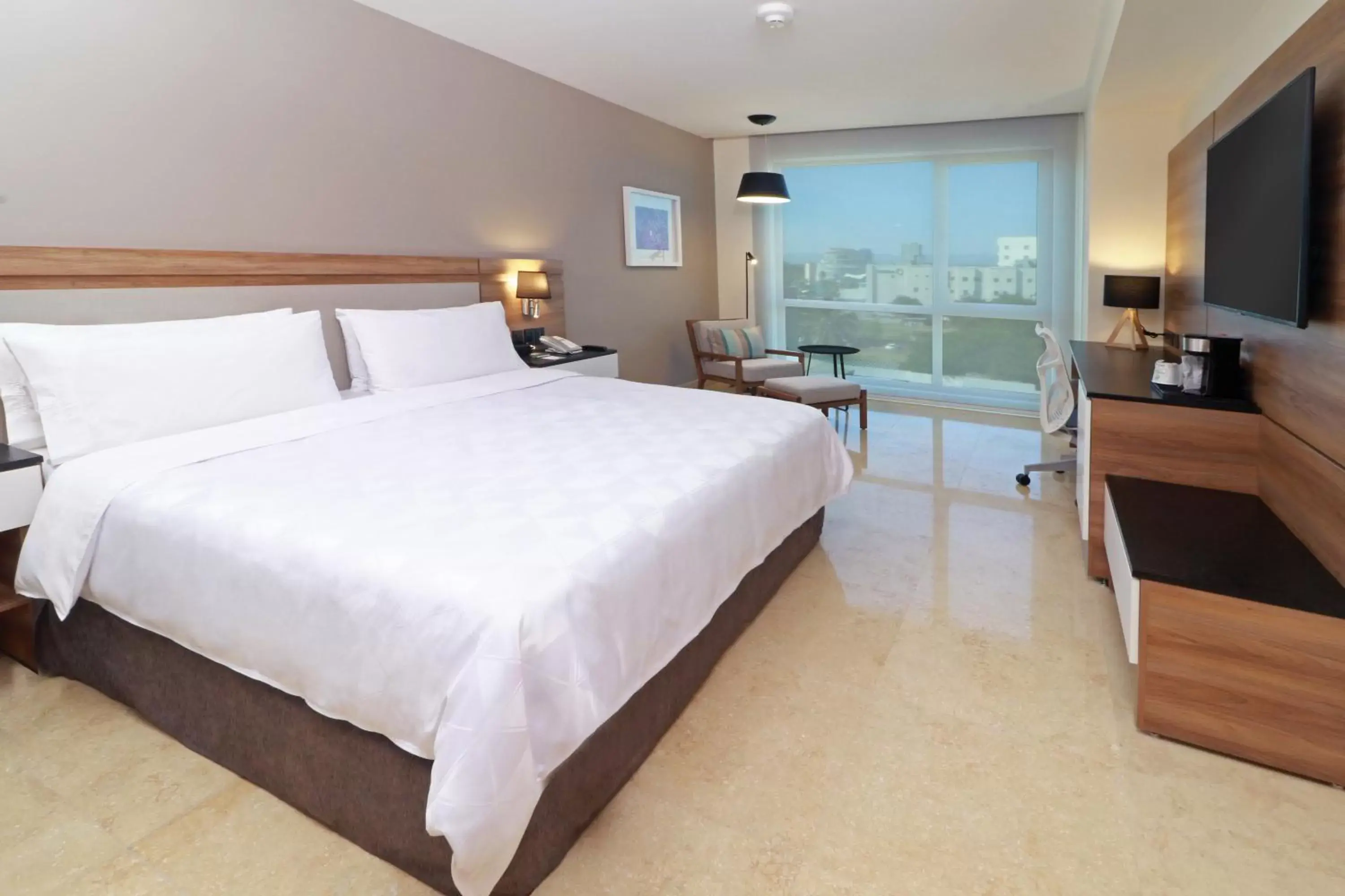 Photo of the whole room, Bed in Holiday Inn & Suites - Puerto Vallarta Marina & Golf, an IHG Hotel