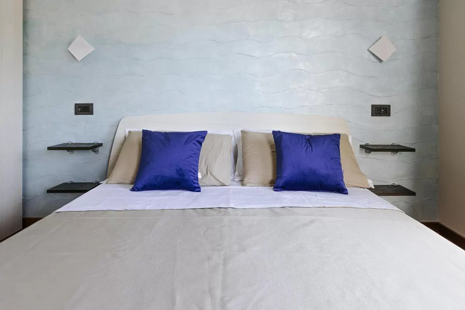 Bed in APULIA BLUE APARTEMENTS & B&B