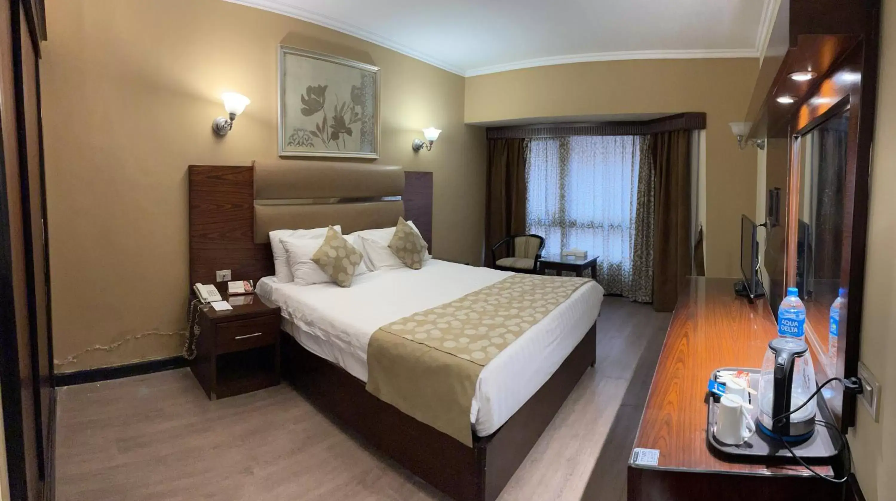 Bed in Pyramisa Suites Hotel Cairo