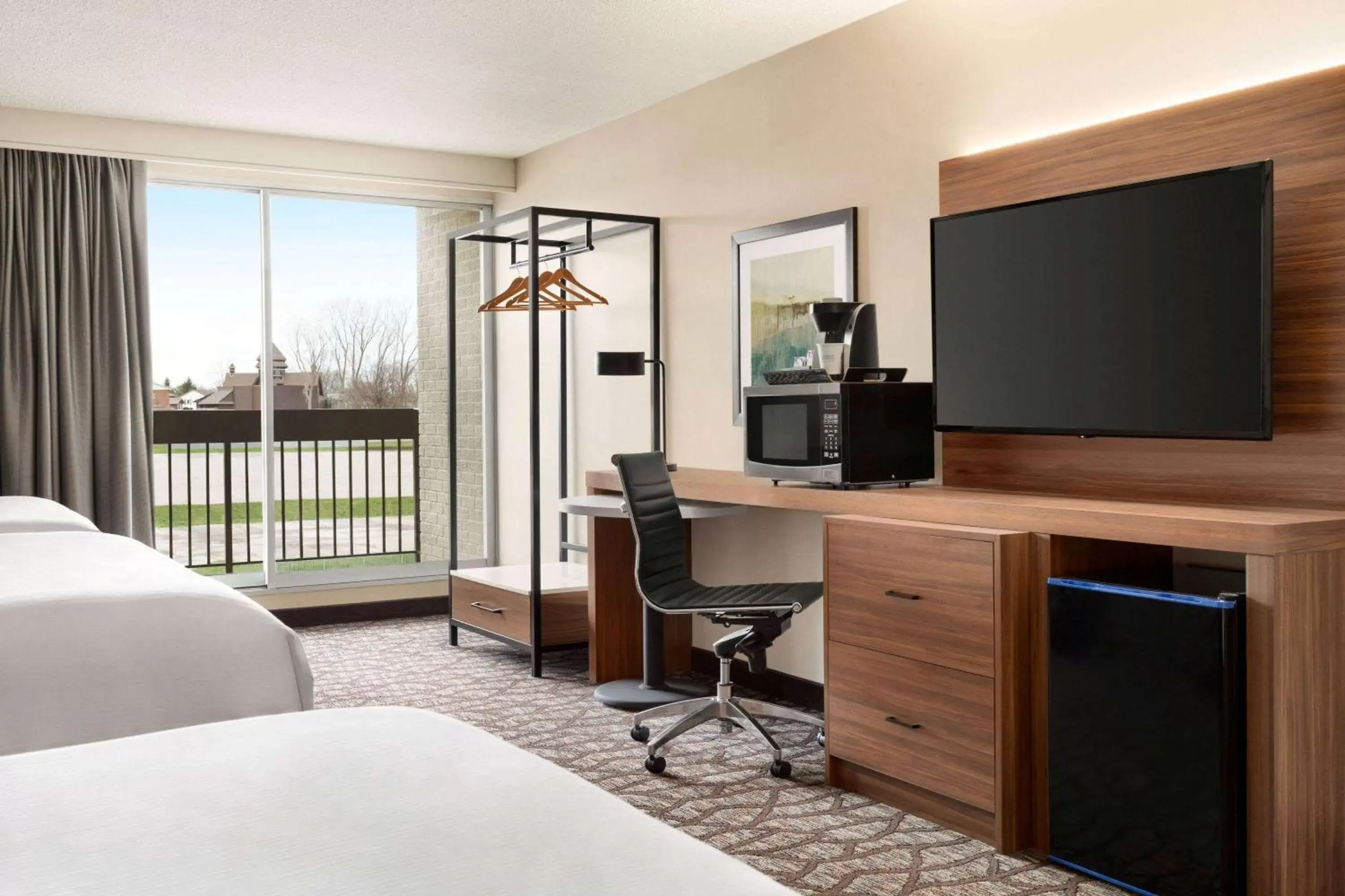 Photo of the whole room, TV/Entertainment Center in Wyndham Garden Niagara Falls Fallsview