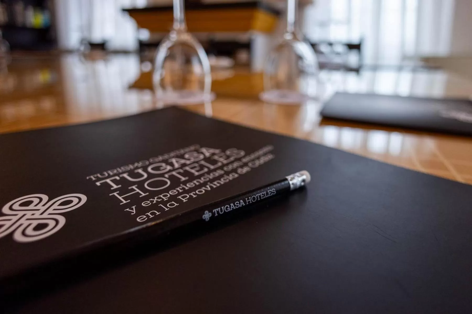 Property logo or sign in Hotel Tugasa Las Truchas