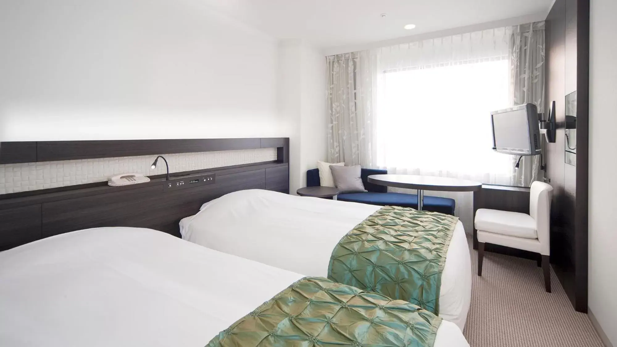 Bed in Hotel Granvia Osaka-JR Hotel Group