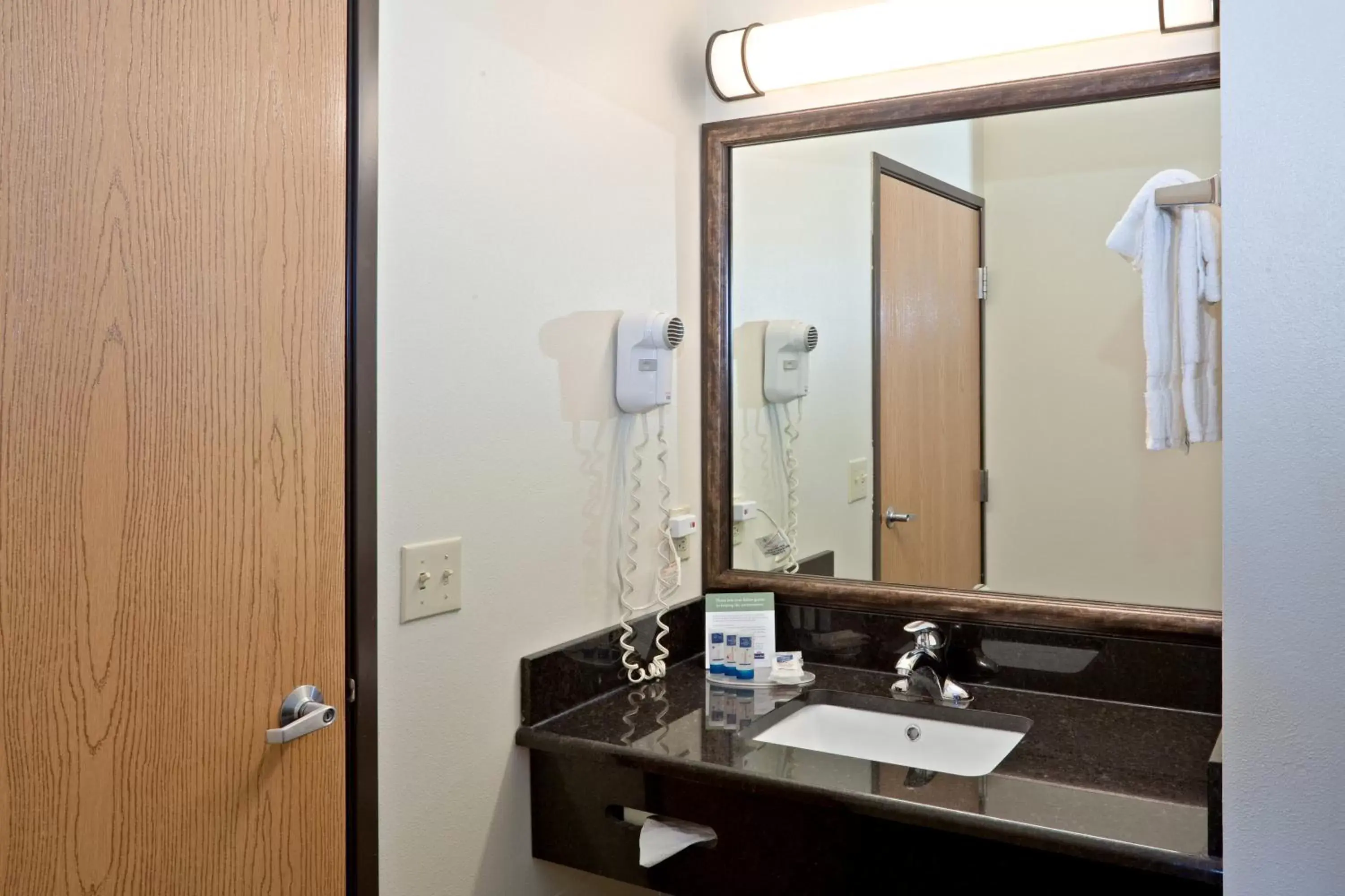 Bathroom in AmericInn by Wyndham Ashland