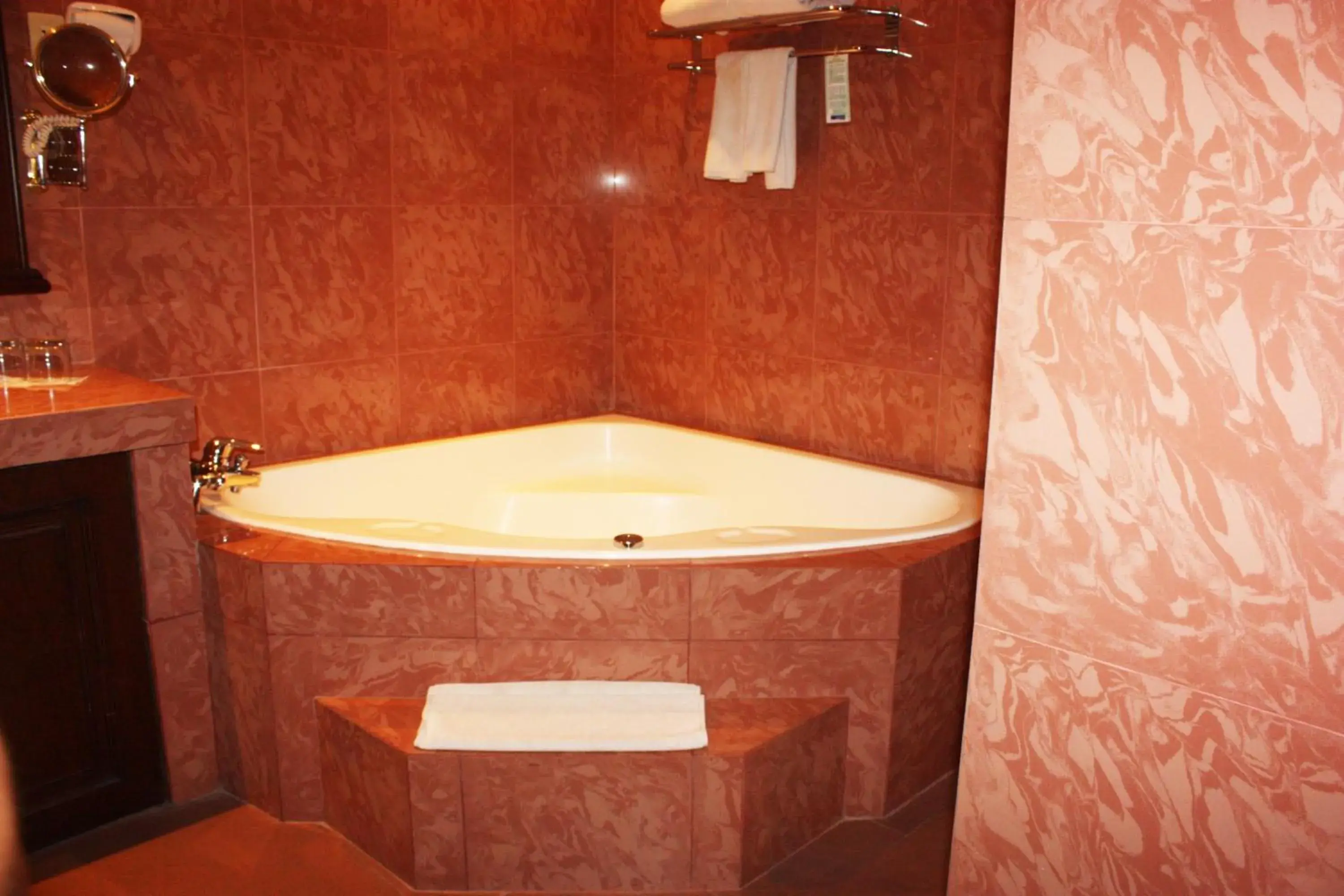 Bathroom in Travellers Suites Serviced Apartments