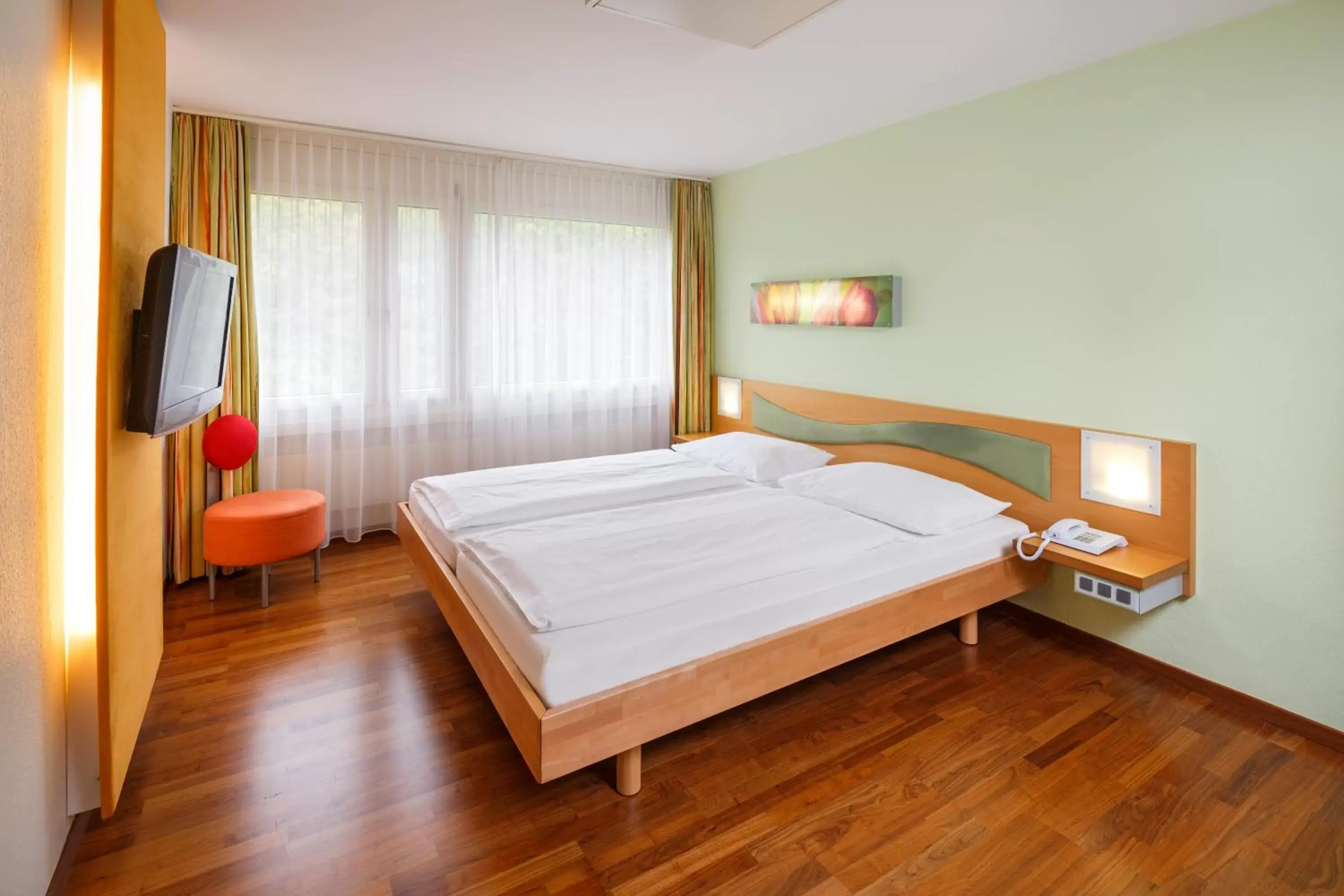 Photo of the whole room, Bed in Ramada by Wyndham Baden Hotel du Parc