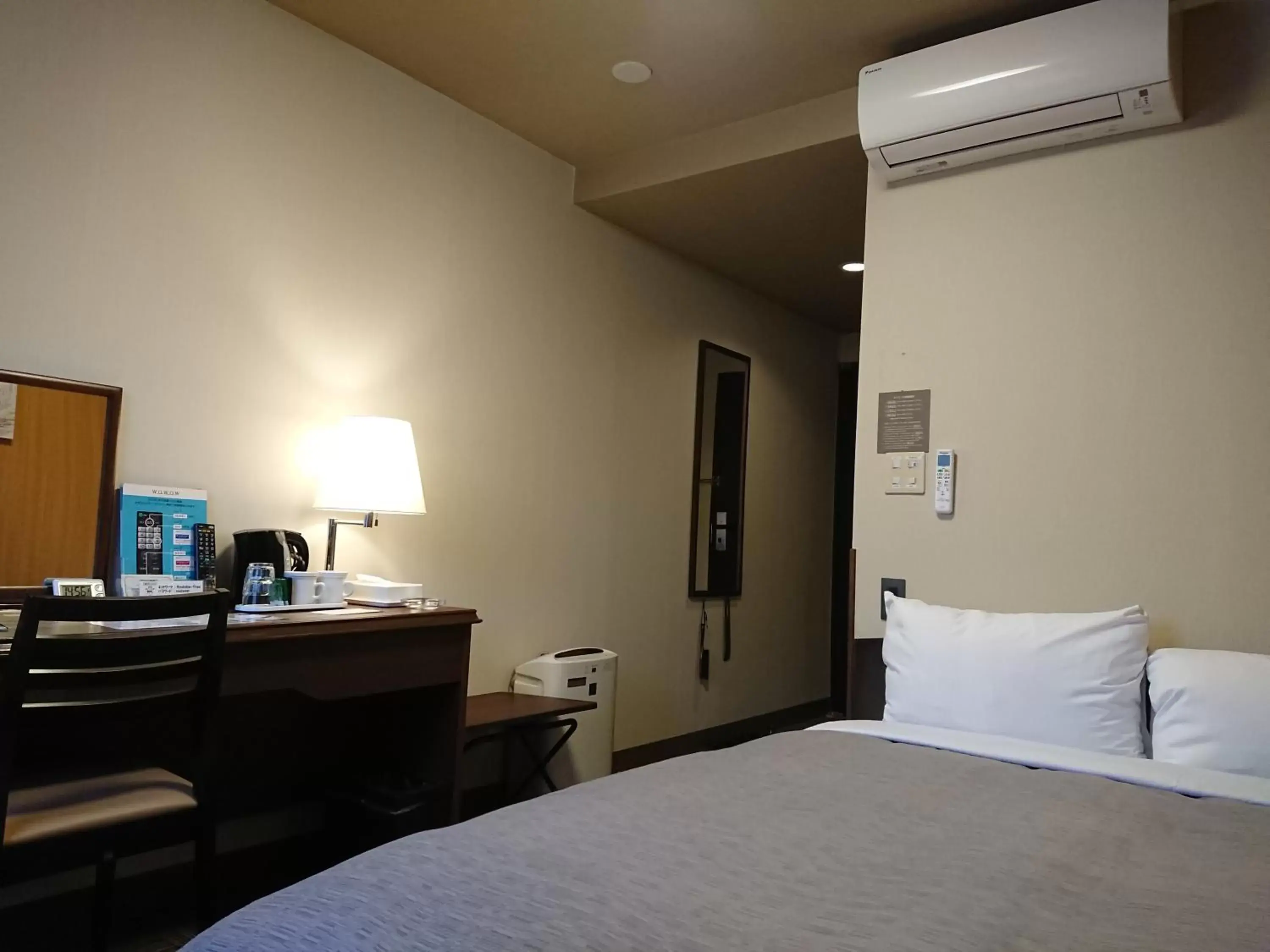 Bed in HOTEL ROUTE-INN Kamiyamada Onsen