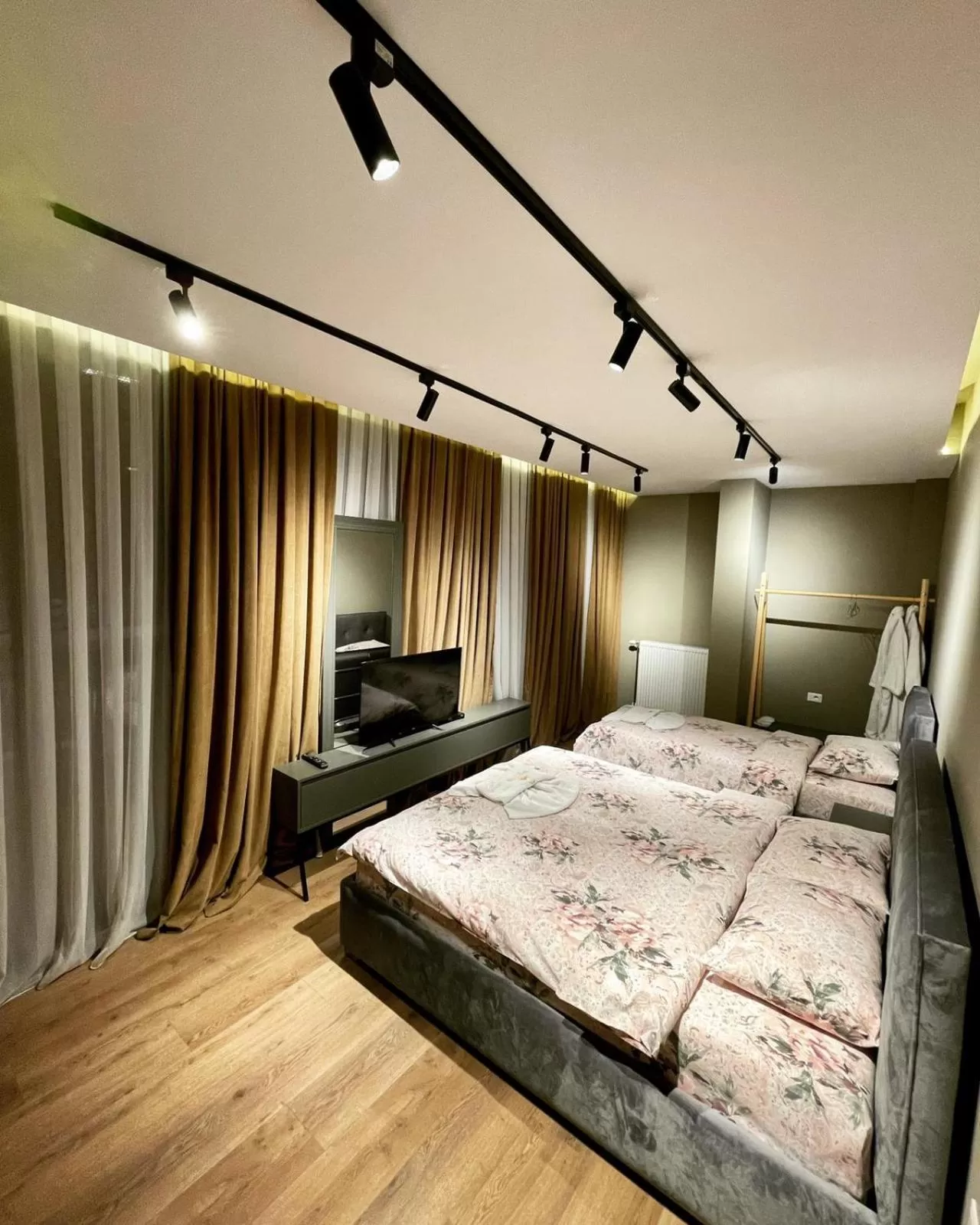 Bed in GRAND JNK Boutique Hotel