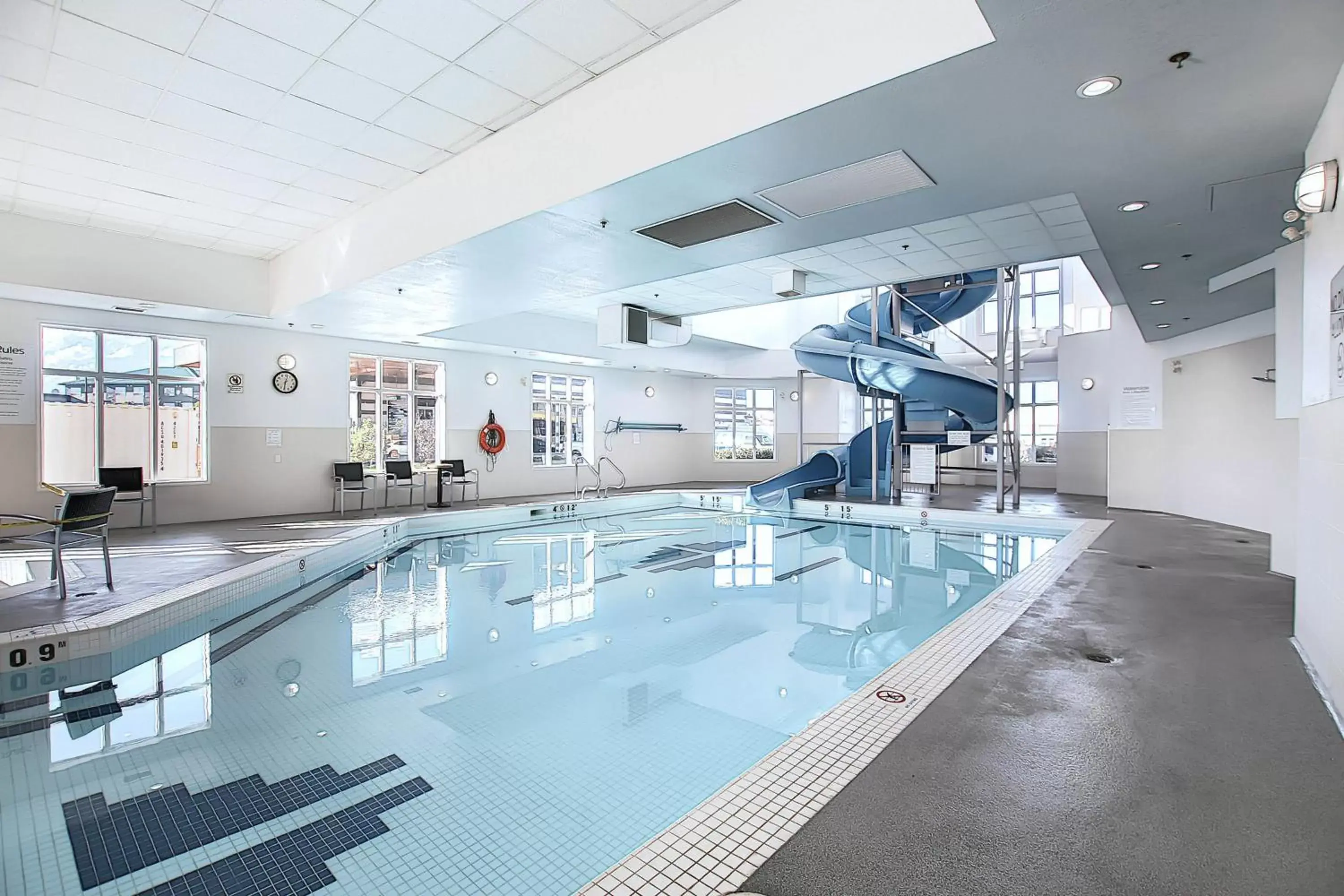 Swimming Pool in Holiday Inn Express Airport Calgary, an IHG Hotel