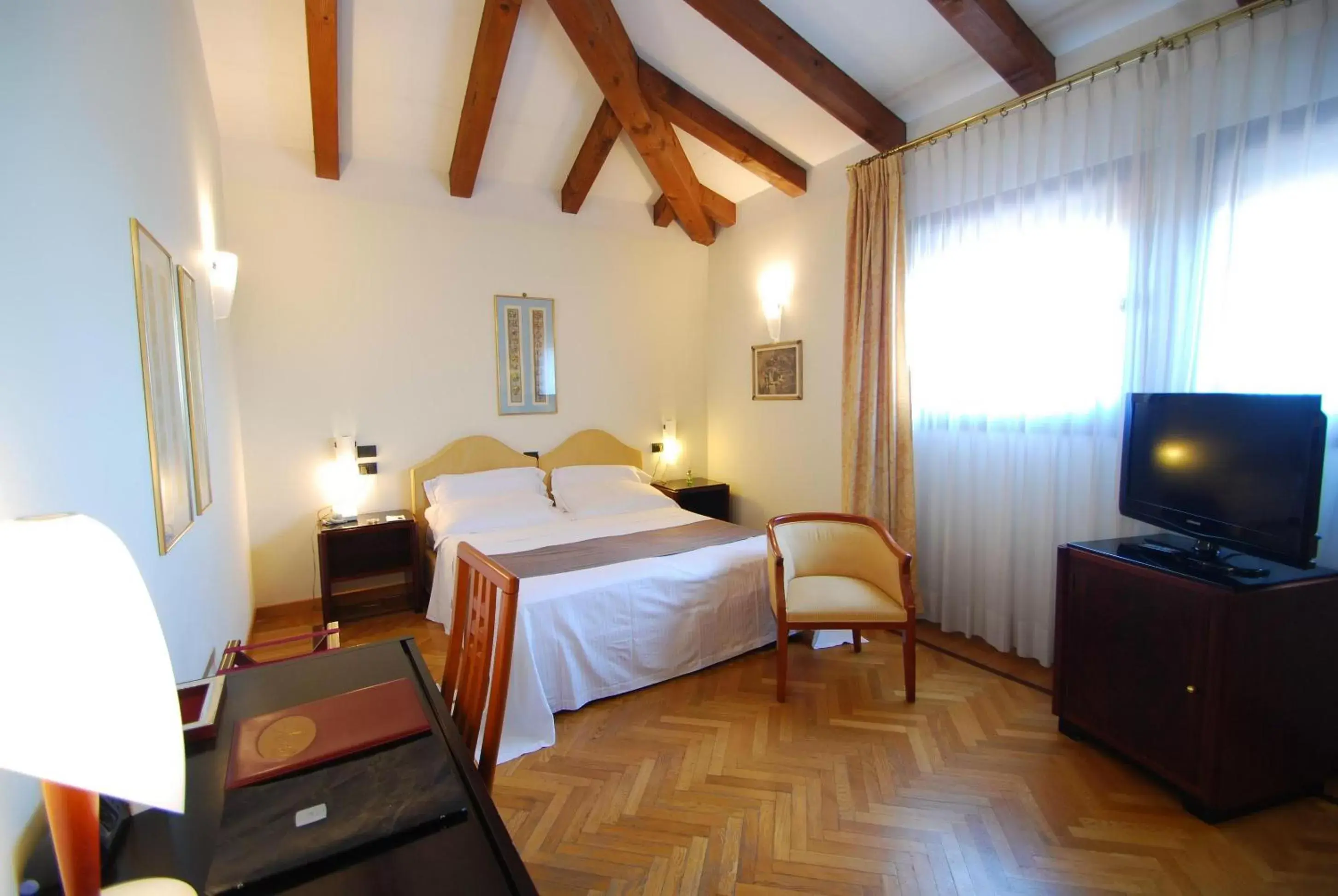 Photo of the whole room, Bed in Alla Rocca Hotel Conference & Restaurant