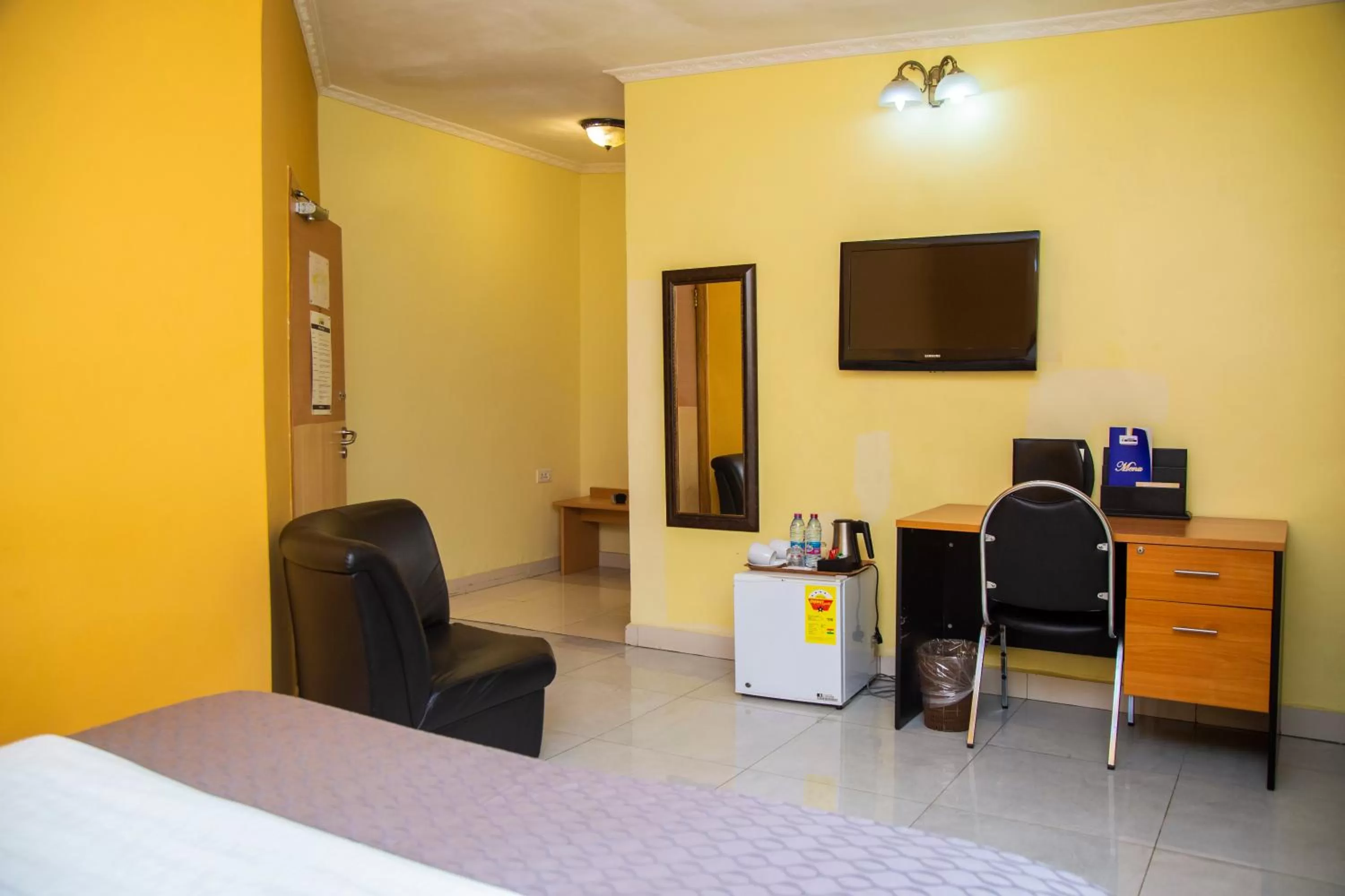 Living room, Bed in Airside Hotel