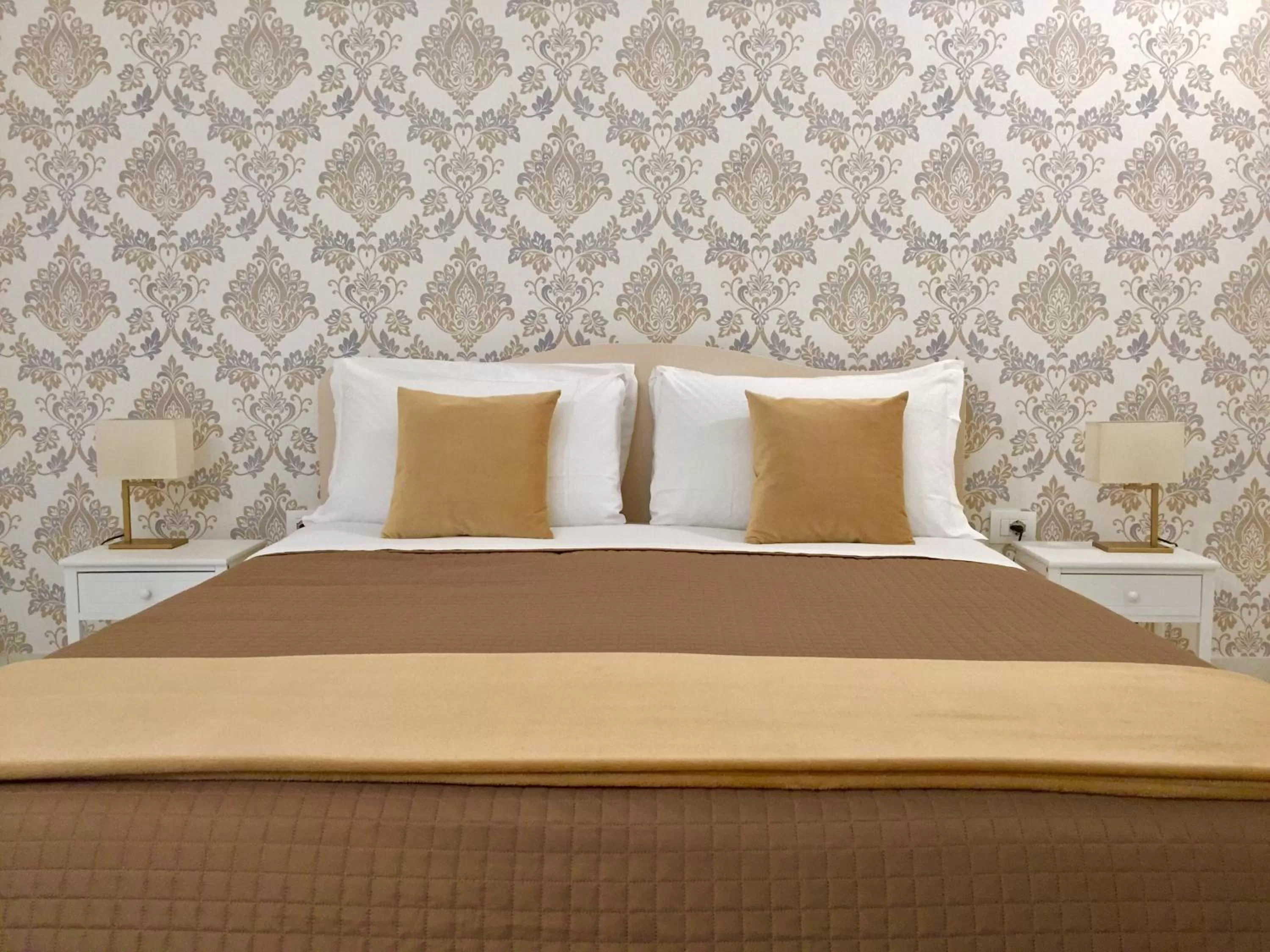 Bed in Dimora San Biagio Suites&Apartment