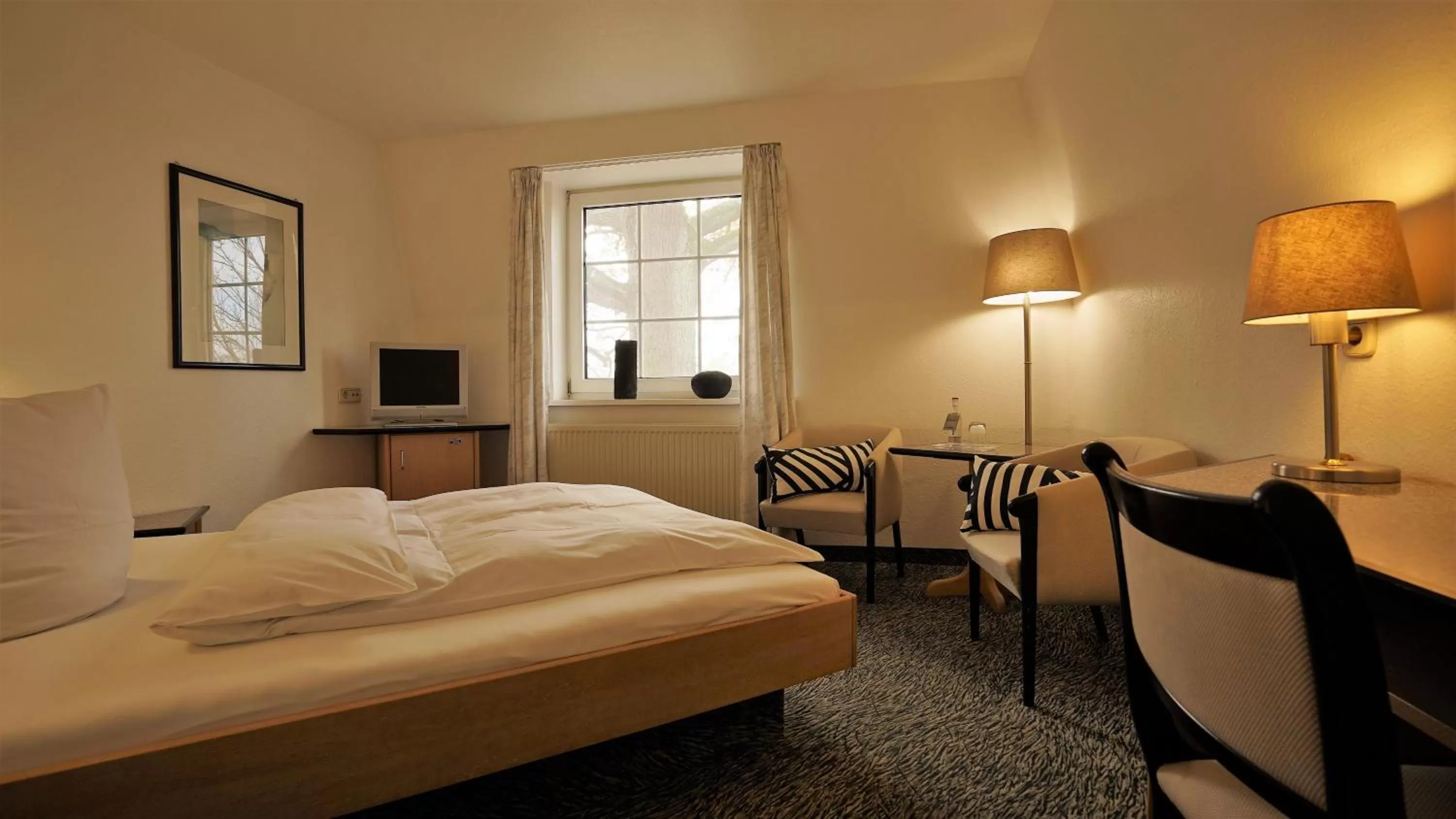 Photo of the whole room, Bed in Brackstedter Mühle e.K.