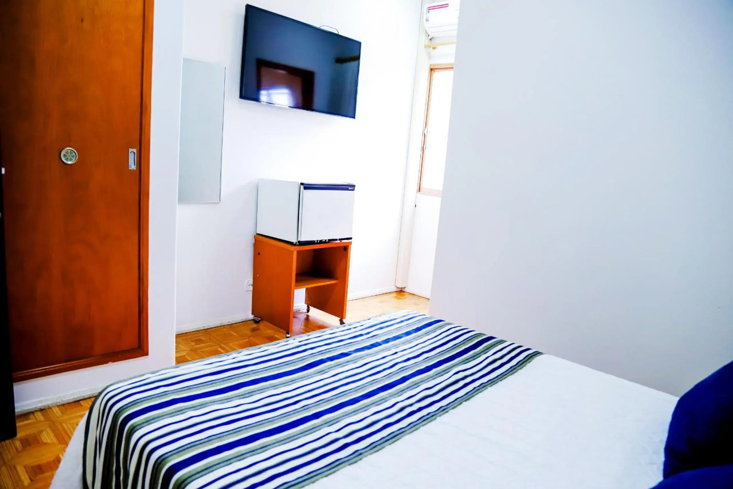 Bed in VOA Hotel Rezende Bed in VOA Hotel Rezende