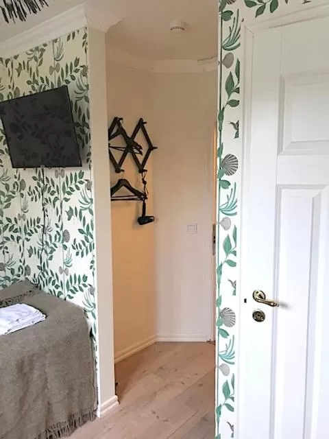 Photo of the whole room, Bed in Hotell Bäckagården