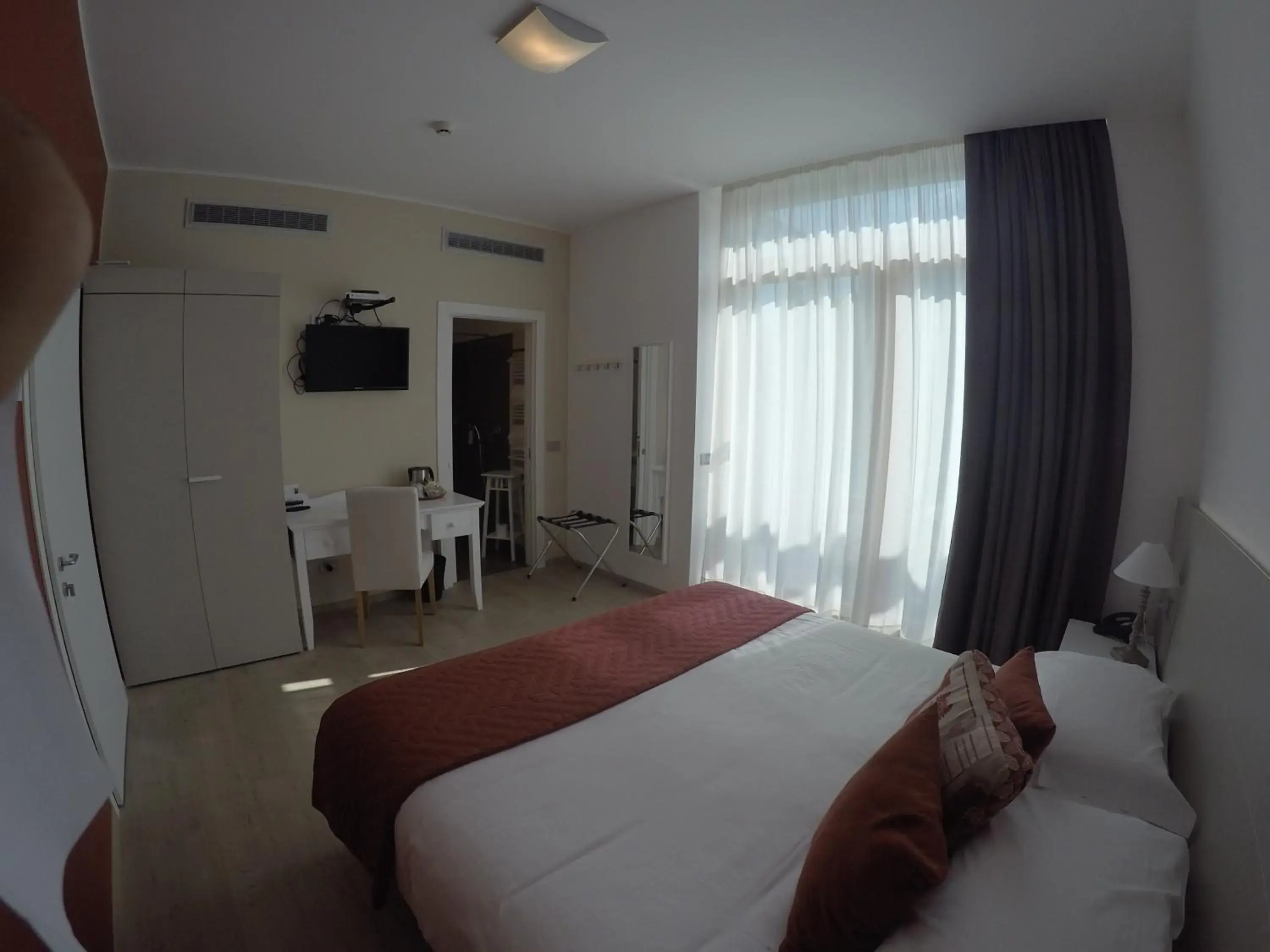 Photo of the whole room, Bed in Tullio Hotel