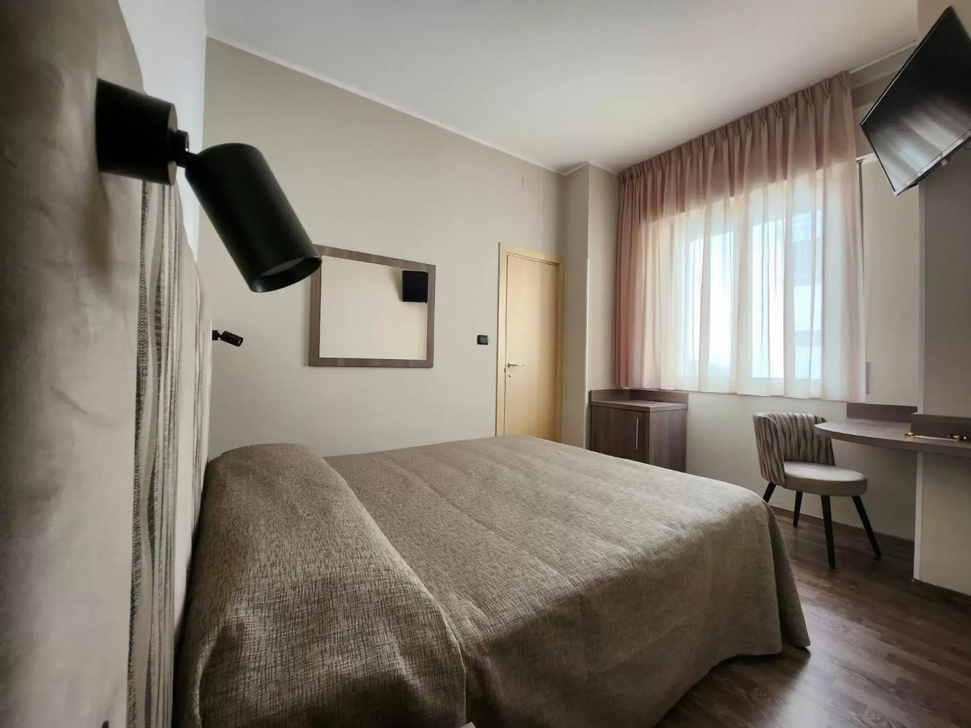 Bed in Hotel Miramare Dipendenza