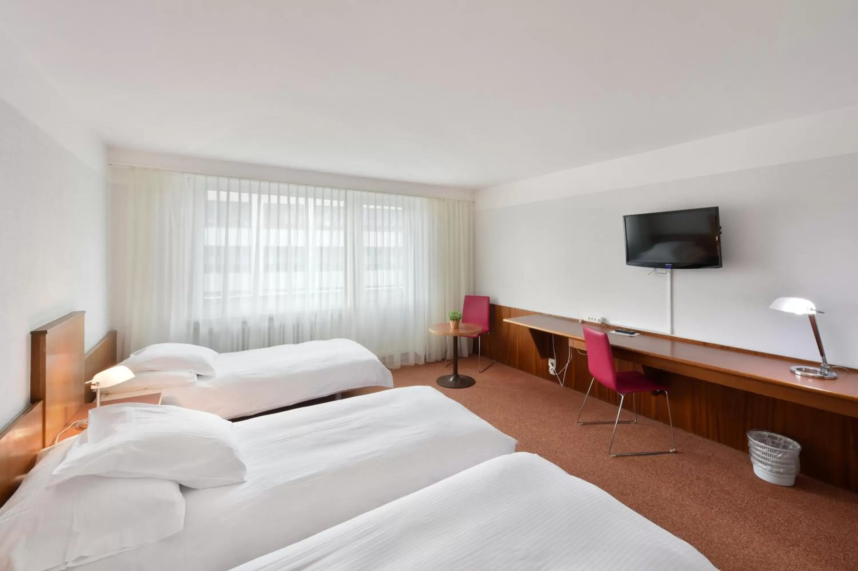 Photo of the whole room, Bed in City Hotel Biel Bienne Free Parking