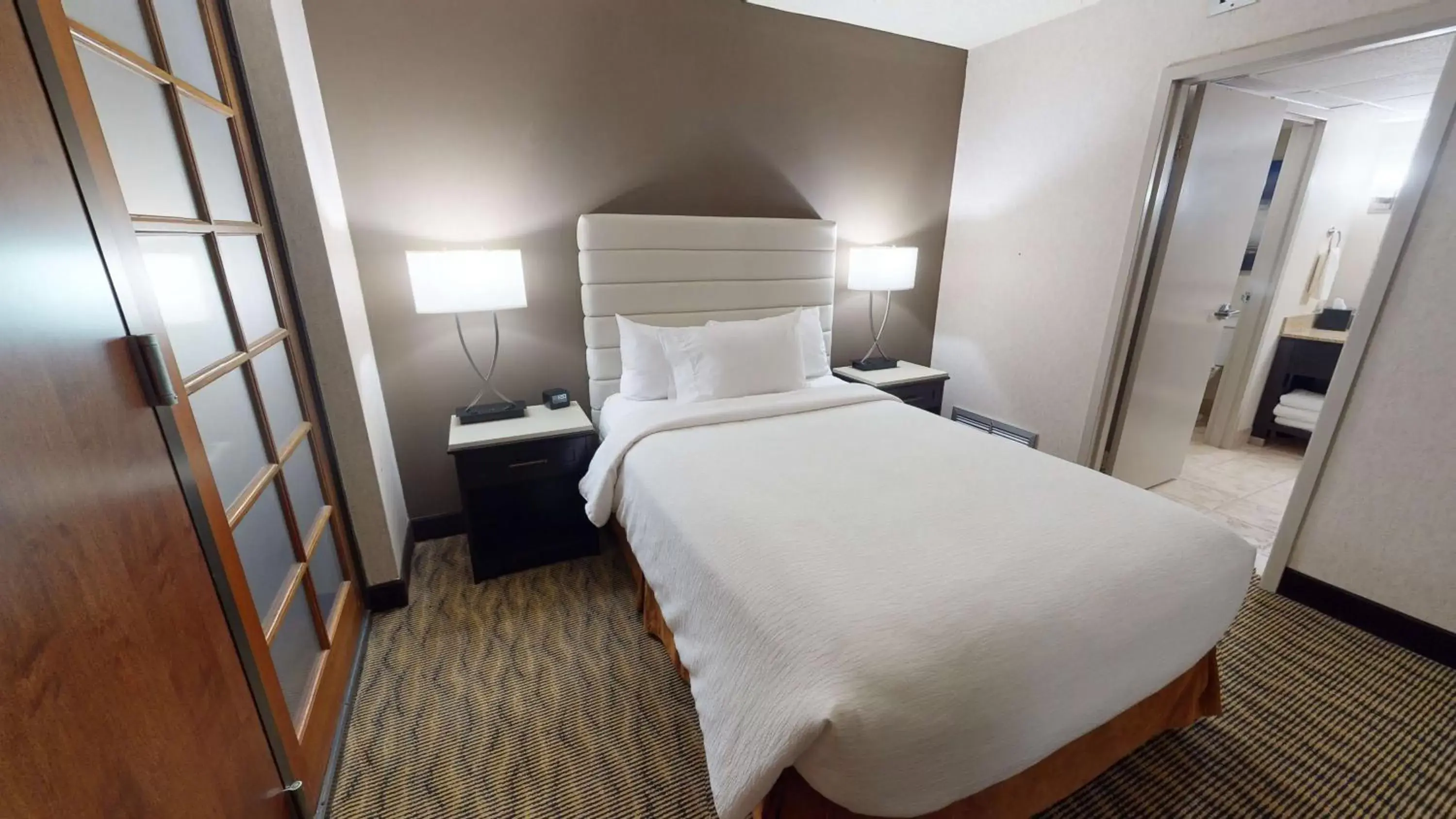 Bed in Embassy Suites by Hilton Oklahoma City Will Rogers Airport