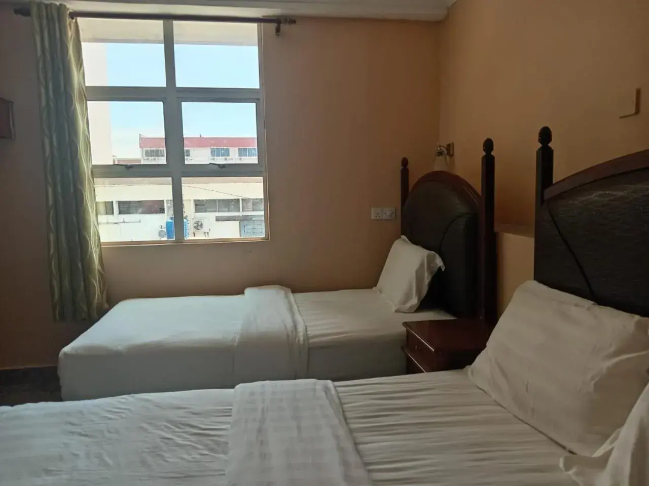 Property building, Bed in HOTEL RK CAHAYA