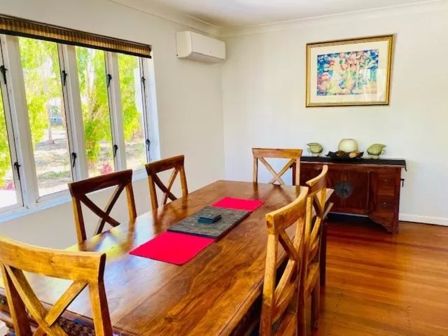 Dining area in BeachView Apartments at Villa Paradiso