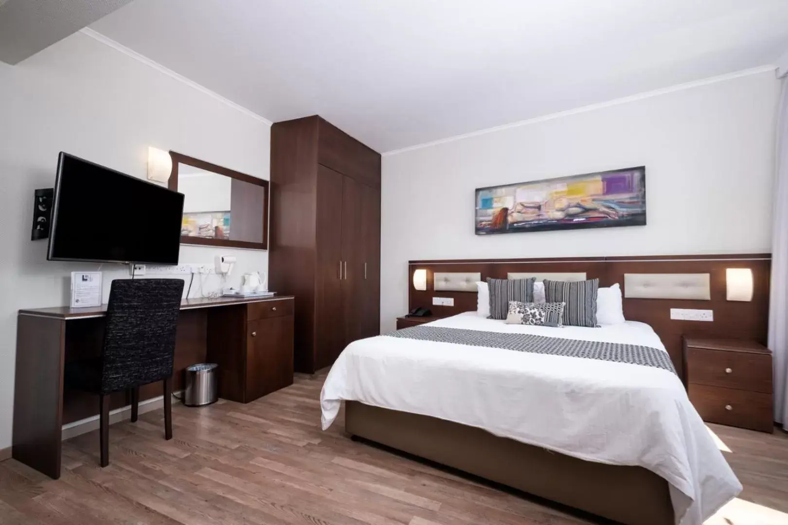 Bed in Livadhiotis City Hotel