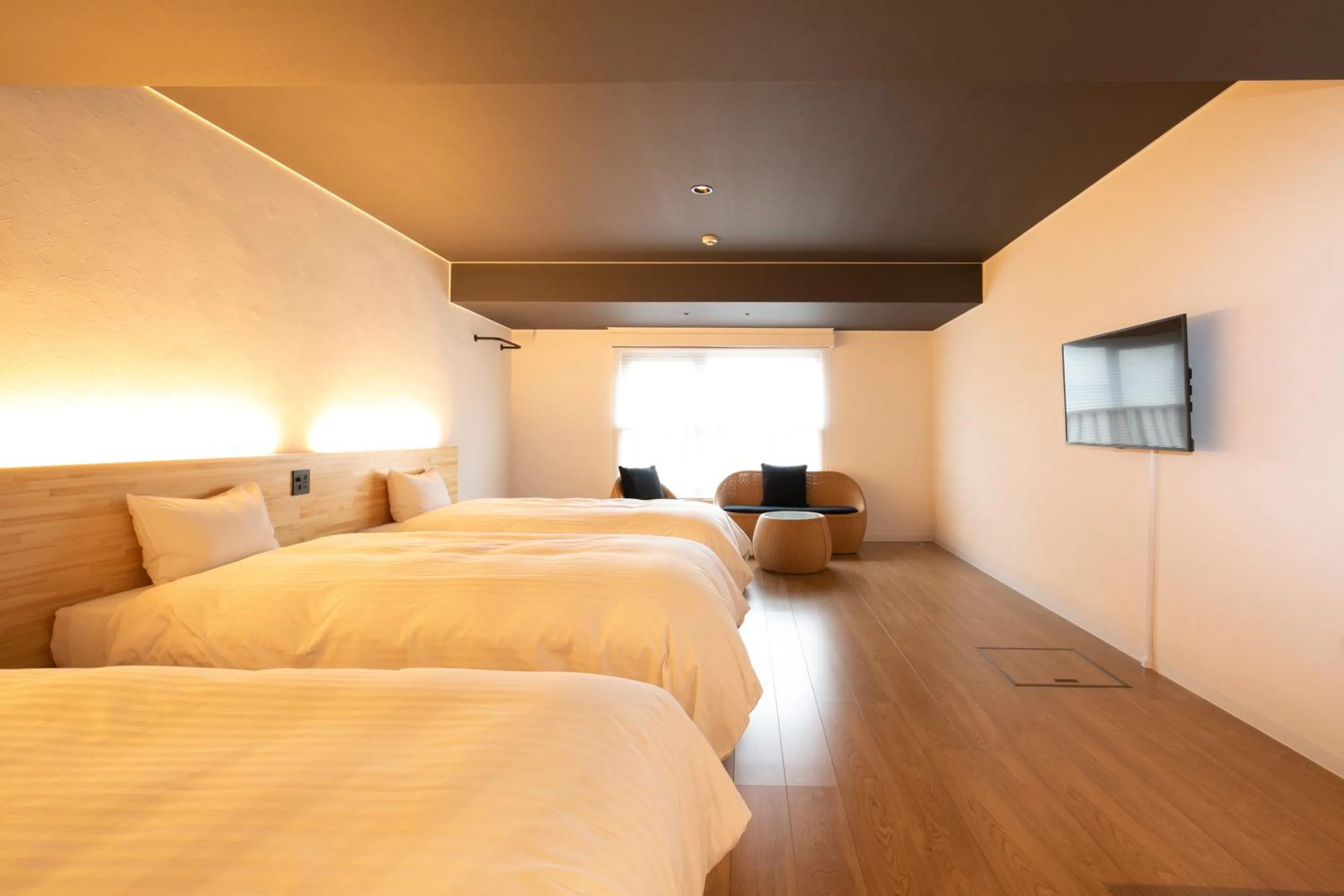 Bed in Kochi Sunrise Hotel