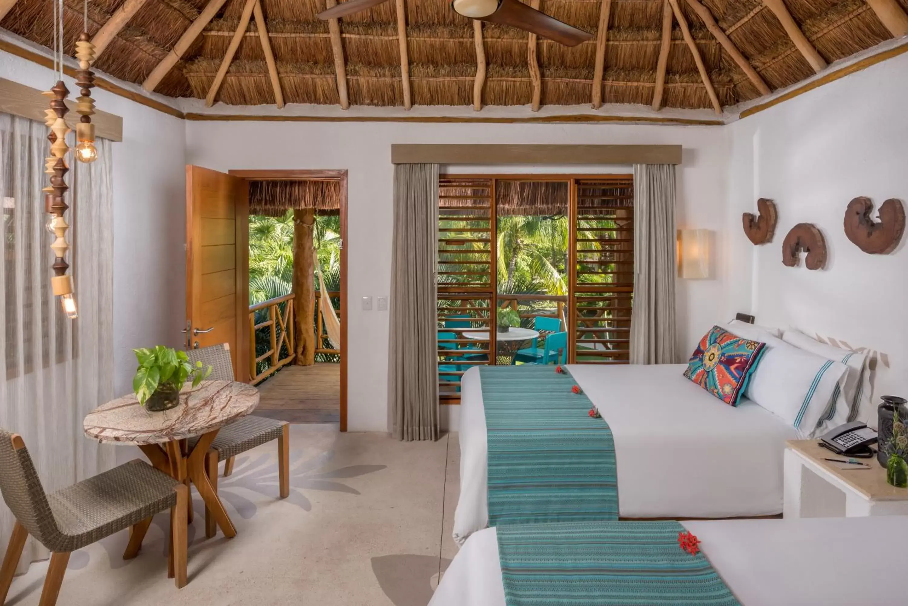 Bedroom, Seating Area in Mahekal Beach Front Resort & Spa