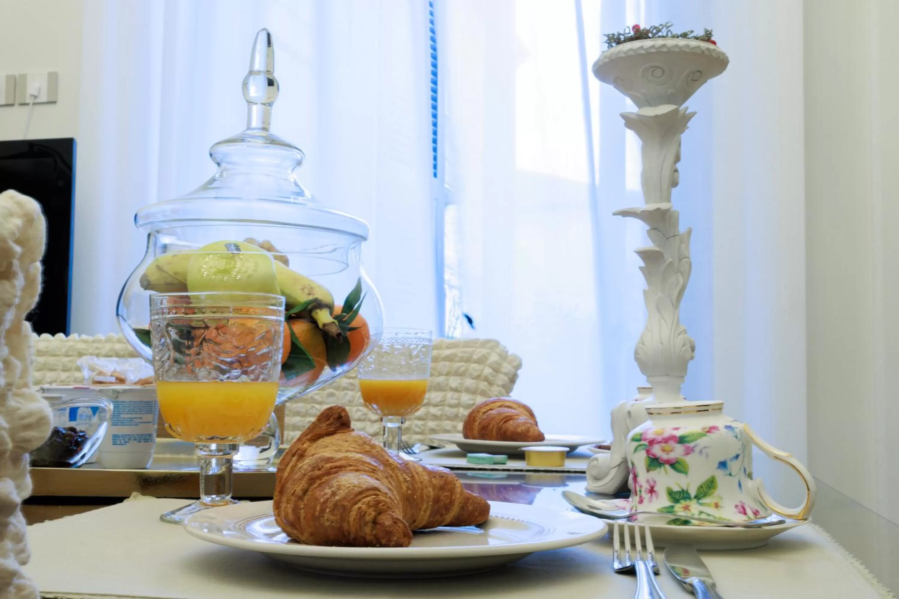 Communal lounge/ TV room in B&B CORSO VITTORIO