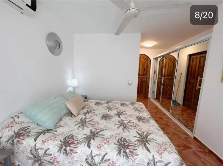 Bed in Los Corales Luxury Villas Beach Club and Spa