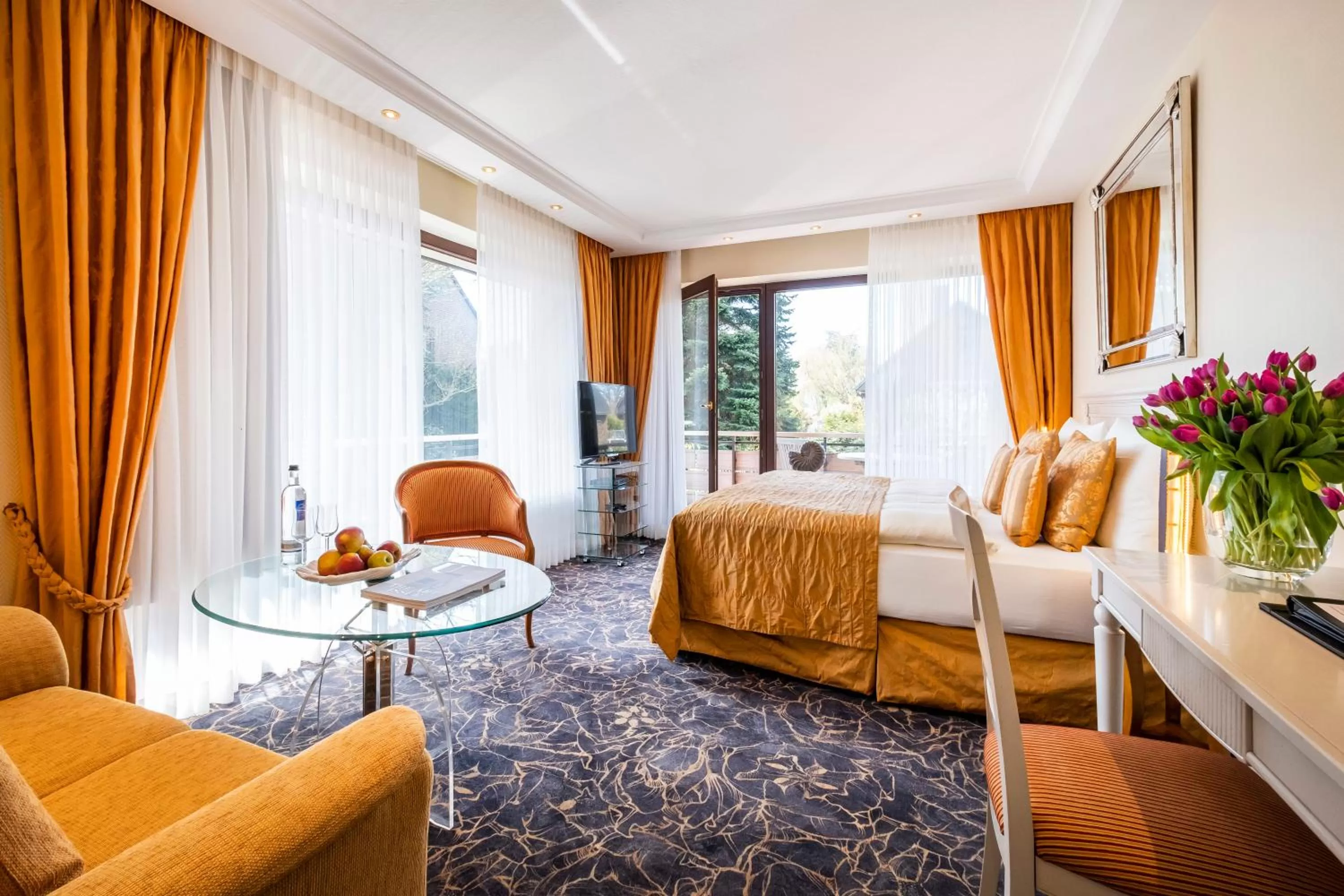 Junior Suite with Balcony and Garden View (4 Adults) in Büngers Apartment-Hotel mit Gartensauna - modern, gemütlich und strandnah