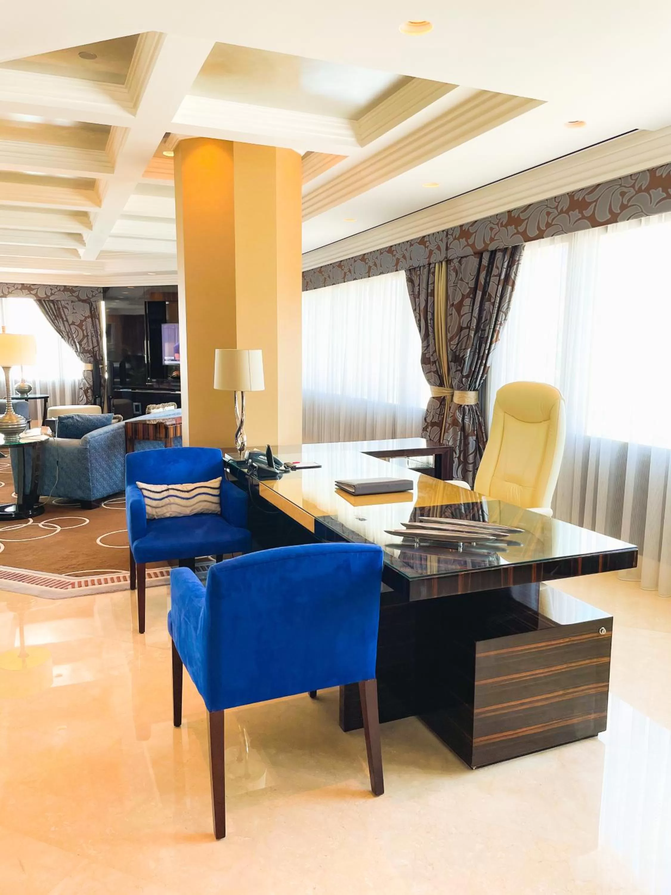 Seating area in Mövenpick Grand Al Bustan