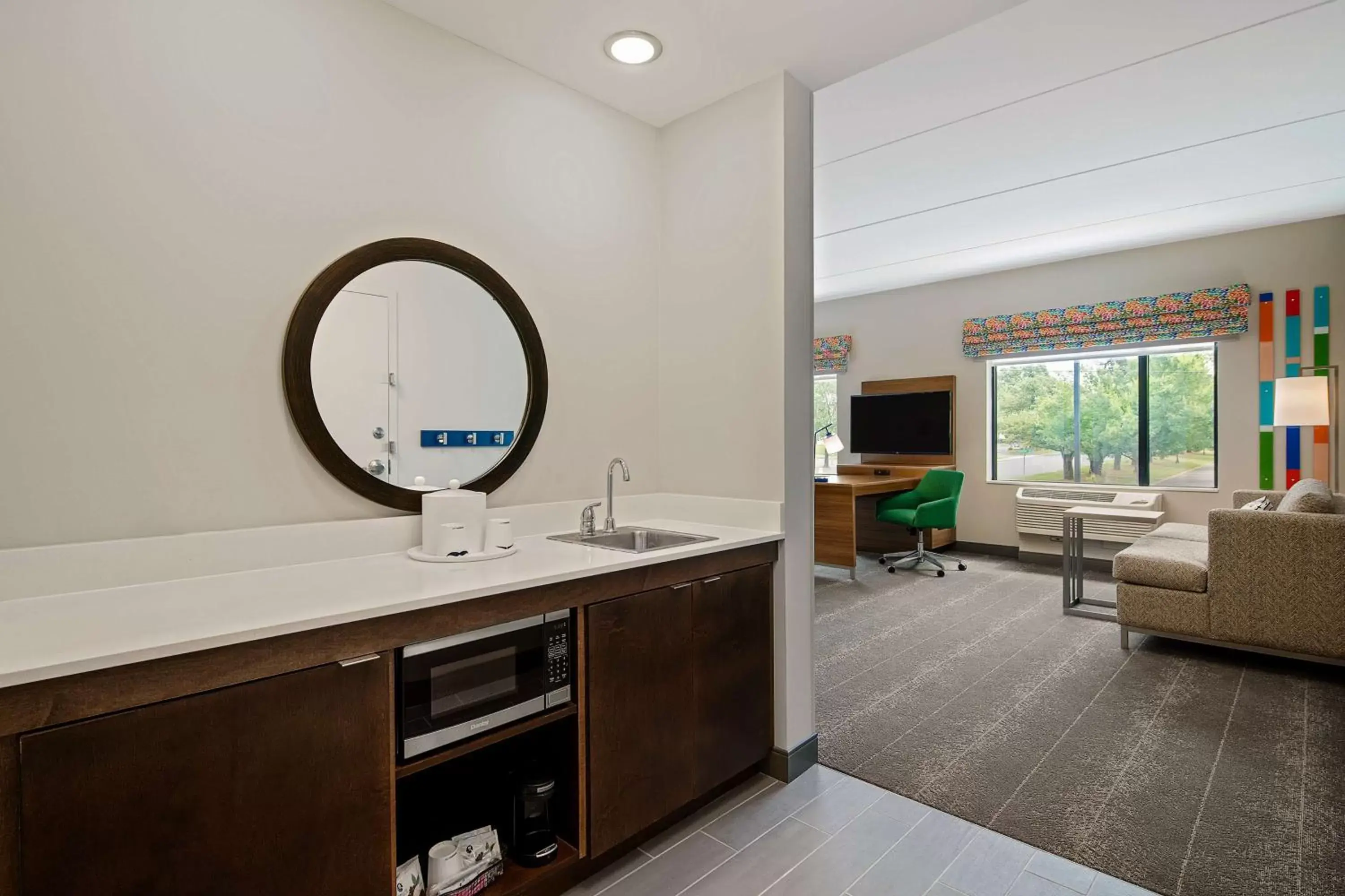 Living room, Bathroom in Hampton Inn & Suites Raleigh Midtown, NC