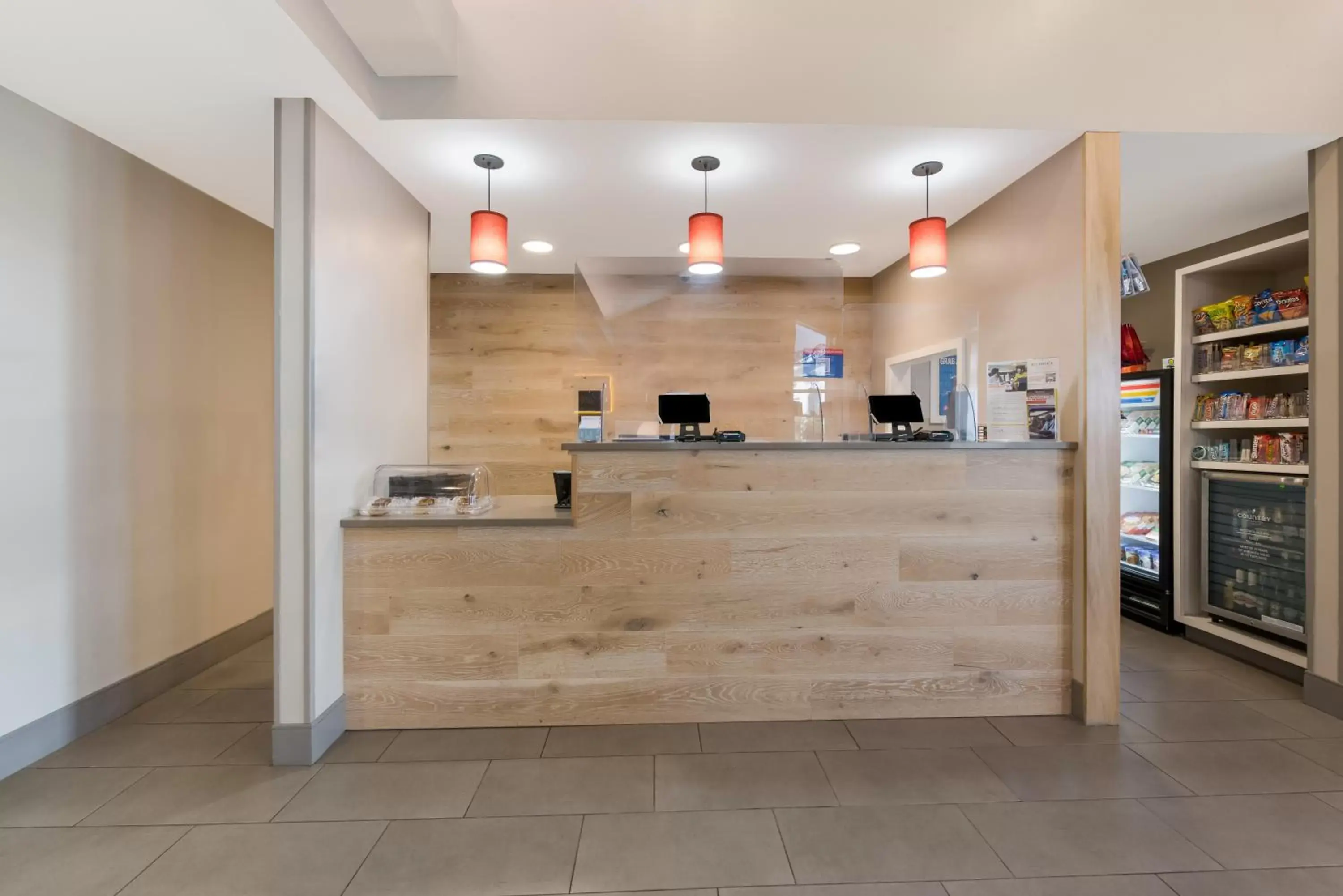 Lobby or reception, Kitchen/Kitchenette in Country Inn & Suites by Radisson, Wichita East, KS