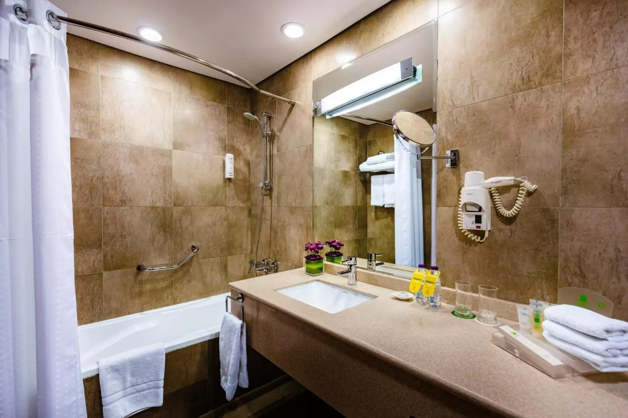 Photo of the whole room, Bathroom in Holiday Inn Riyadh Al Qasr, an IHG Hotel