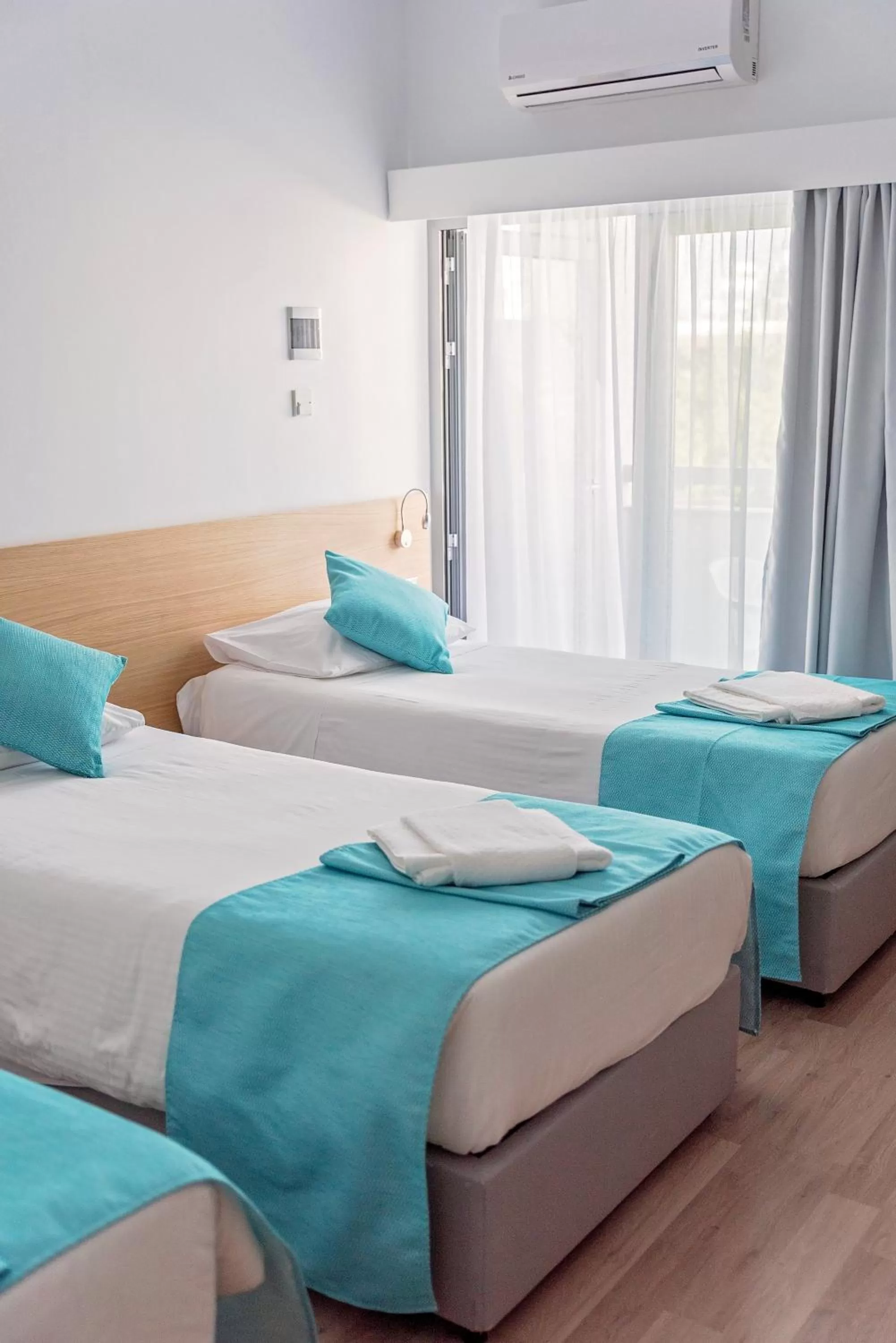 Bed in Pyramos Hotel