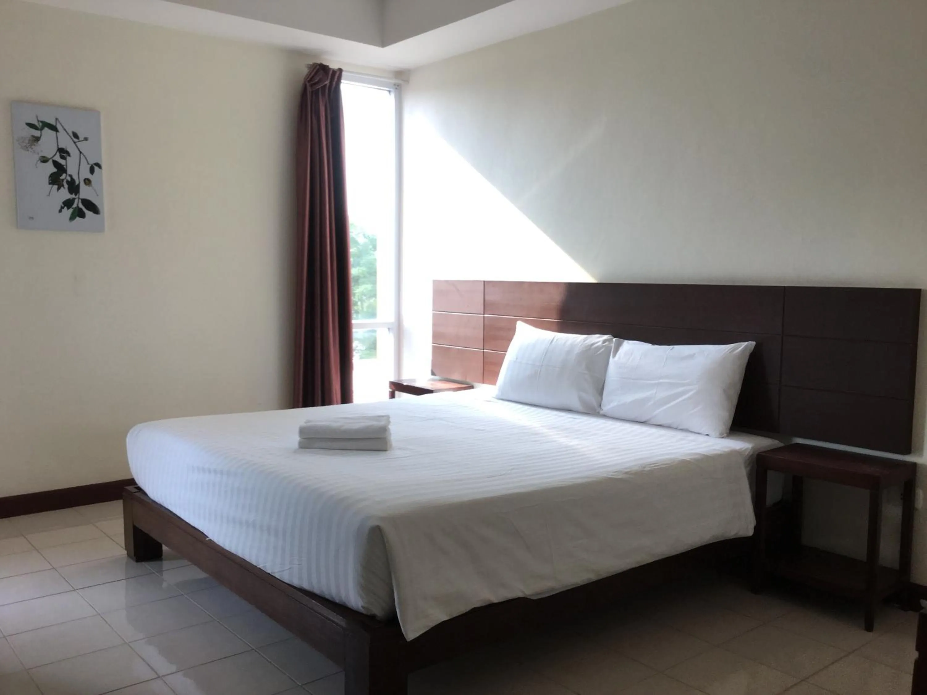 Bed in The One Residence