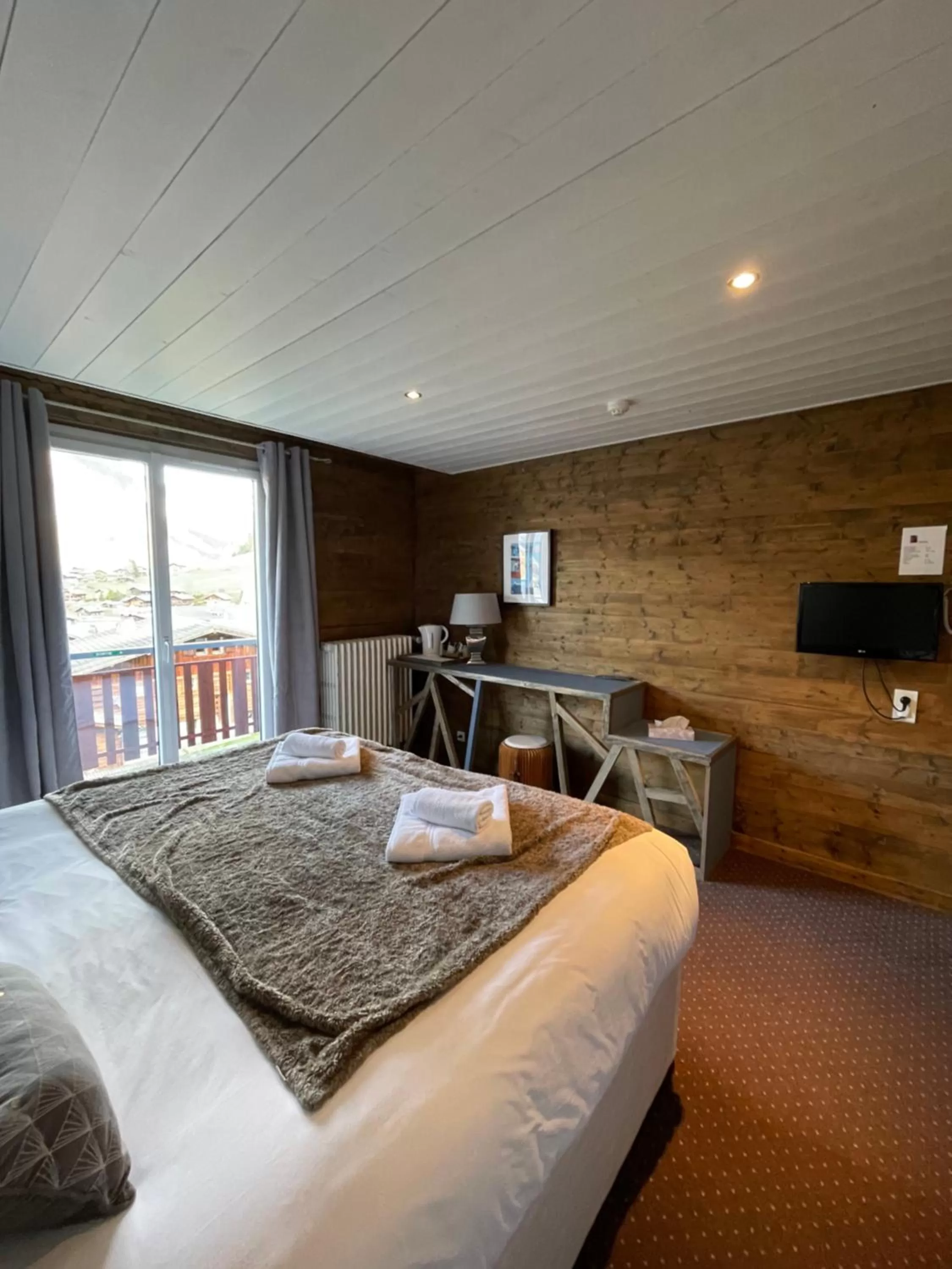 Bed in Hôtel La Chaumière