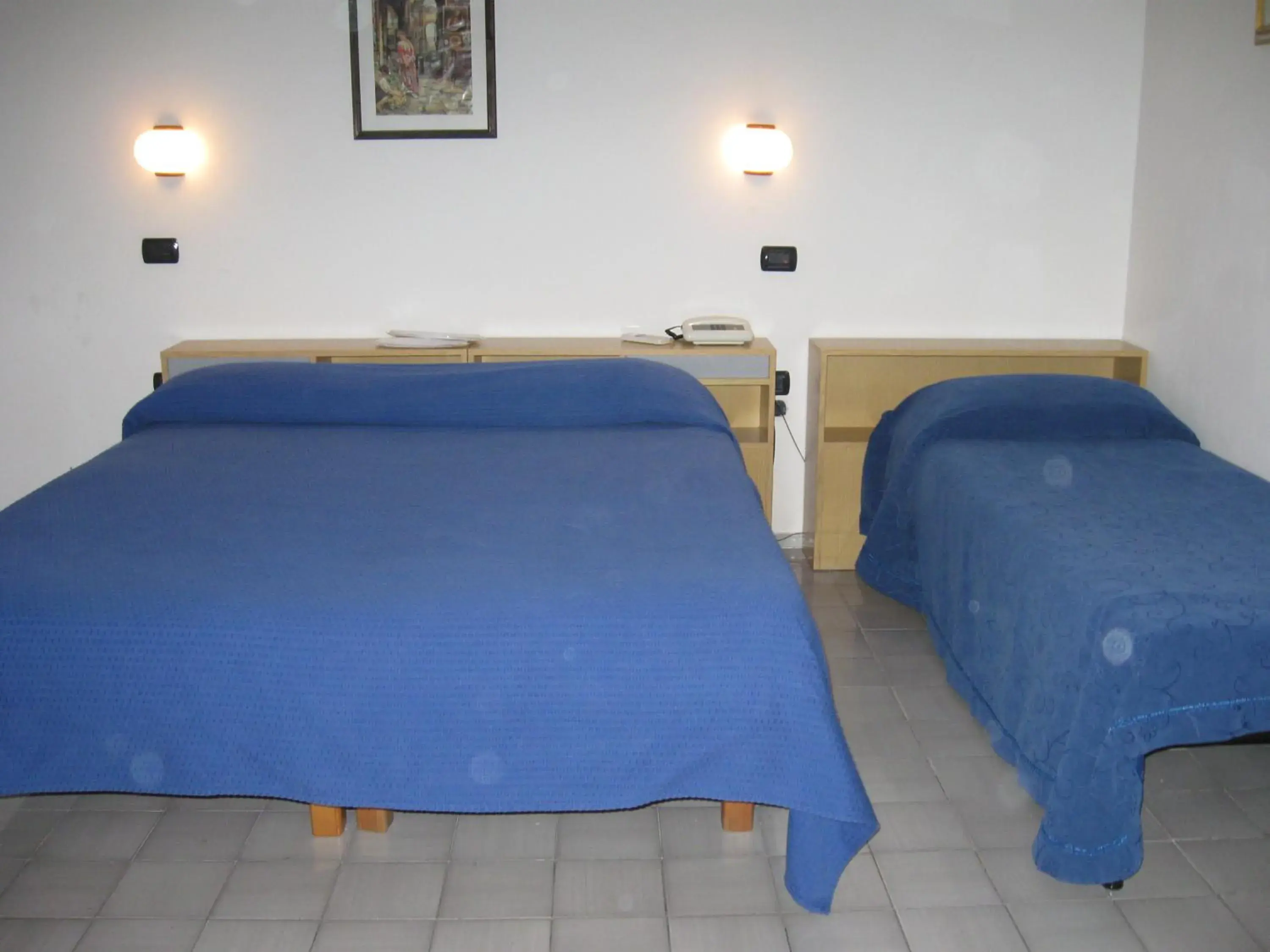 Bed in Hotel Caporal