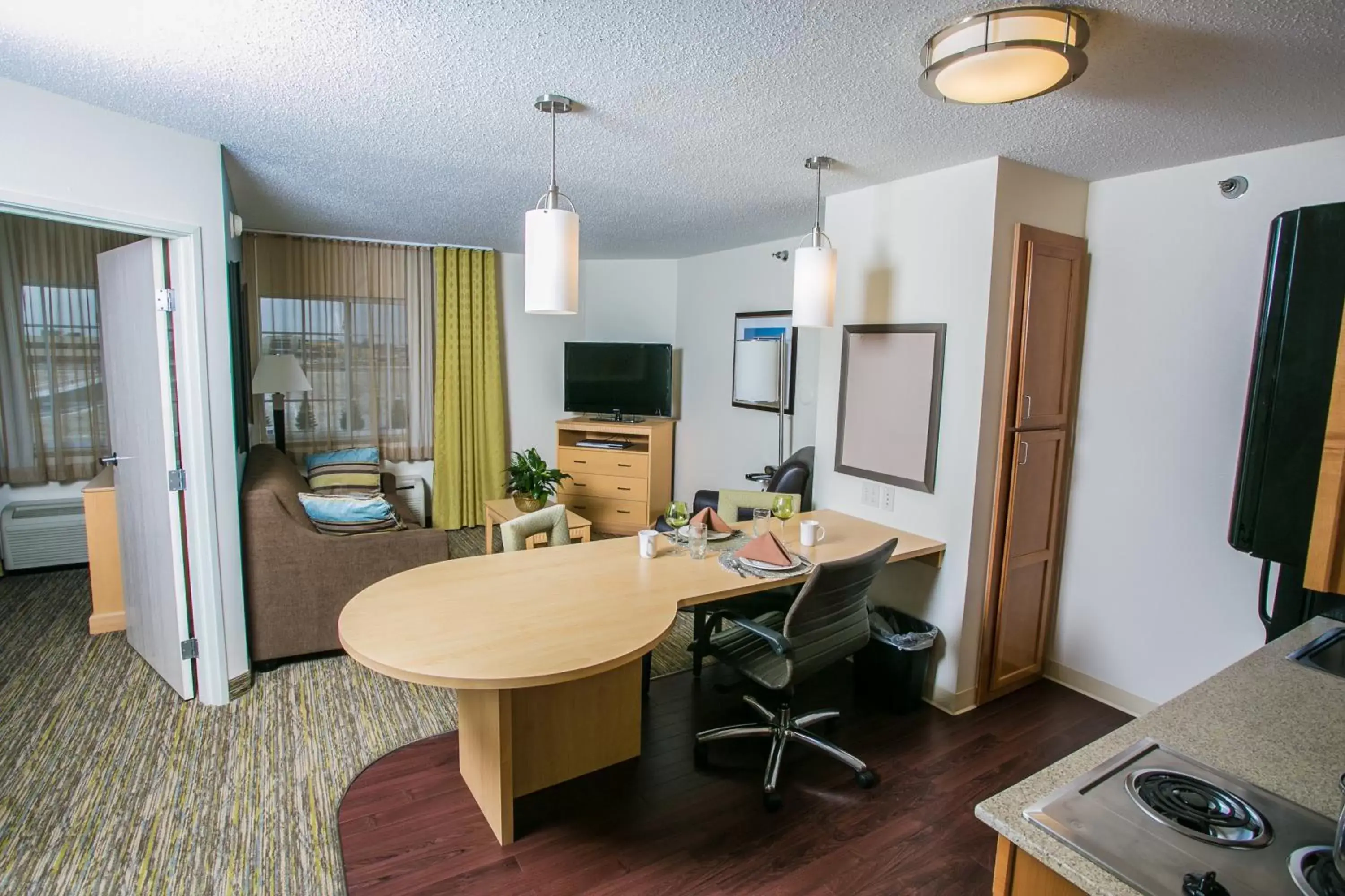 Photo of the whole room in Candlewood Suites Fargo-North Dakota State University, an IHG Hotel