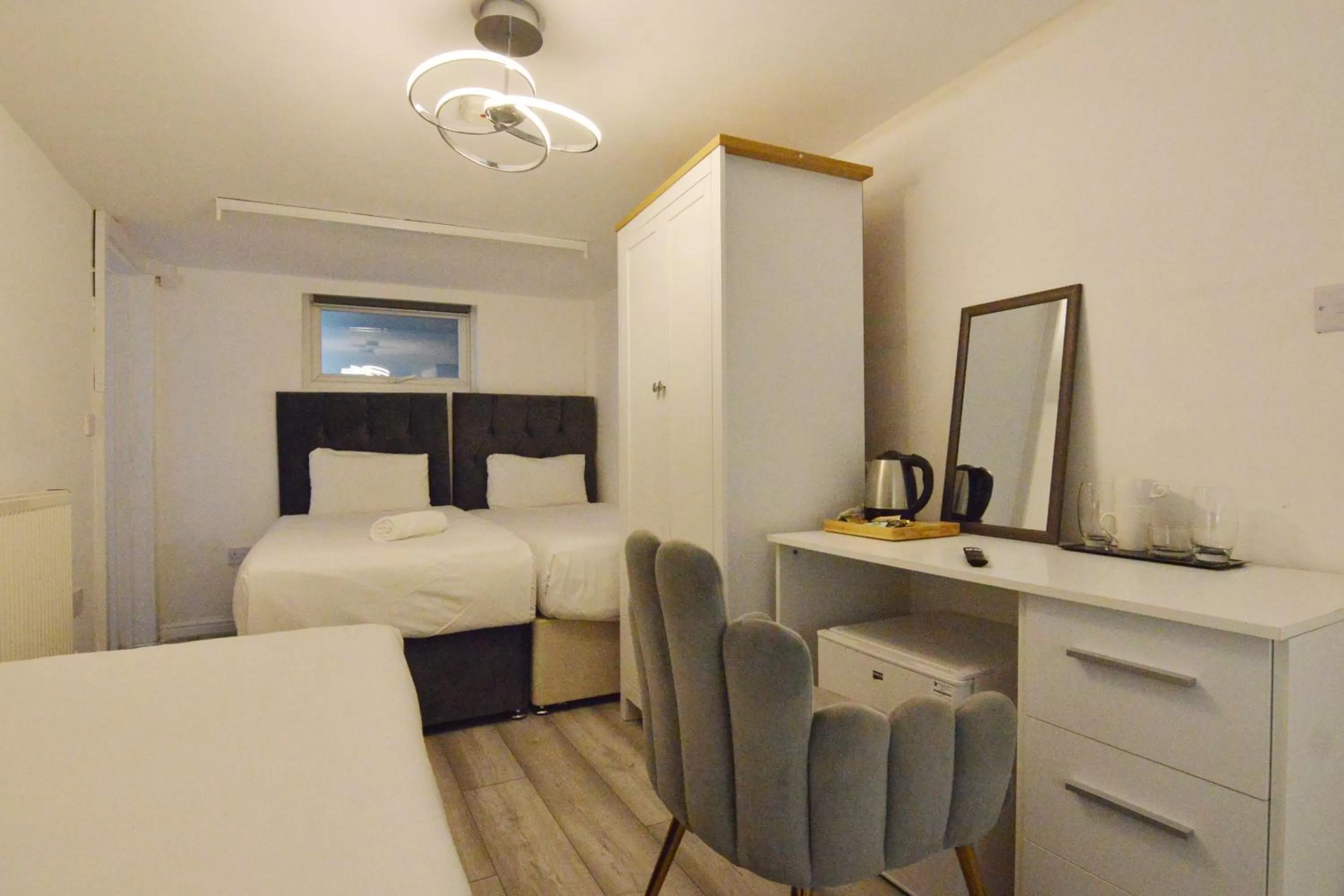 Bed in Anchor Guest House